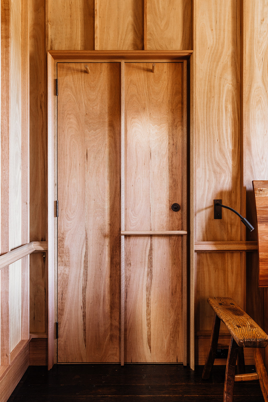 Bozen's Cottage by Taylor + Hinds Architects — A close-up view of joinery details within the restored interior, showcasing the careful craftsmanship central to the project's philosophy.