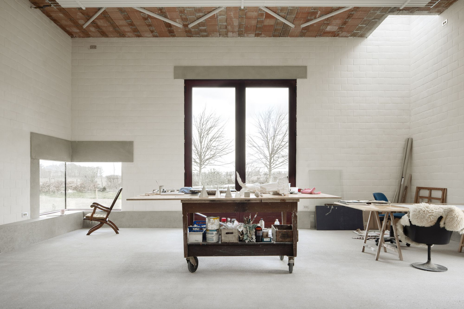 Studio SDS by GRAUX & BAEYENS — Studio SDS's working interior captured mid-project, revealing the artist's operational space.