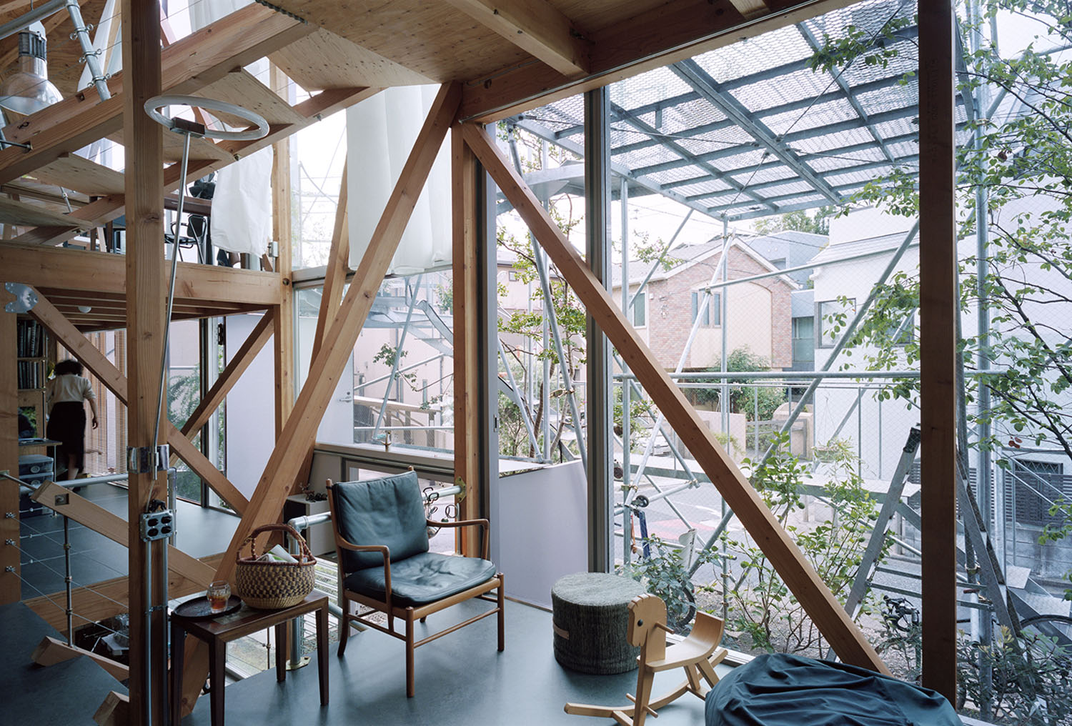 Daita2019 House by Suzuko Yamada Architects — Interior view of the three-story Daita2019 residence frames the dwelling as a permeable threshold between domestic space and urban garden.