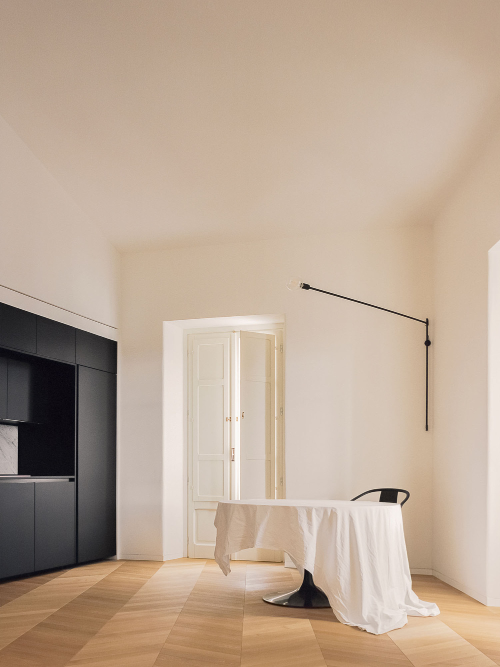 House for a Couple by SET Architects — A renovated residential interior combining contemporary spatial fluidity with period references.