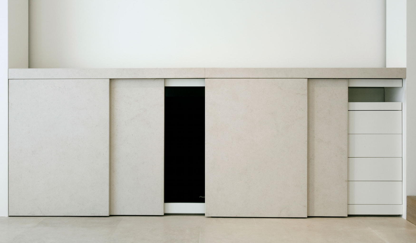 Alkema Studio by Jen Alkema Architect — A minimalist interior threshold defined by geometric planes and material contrast.
