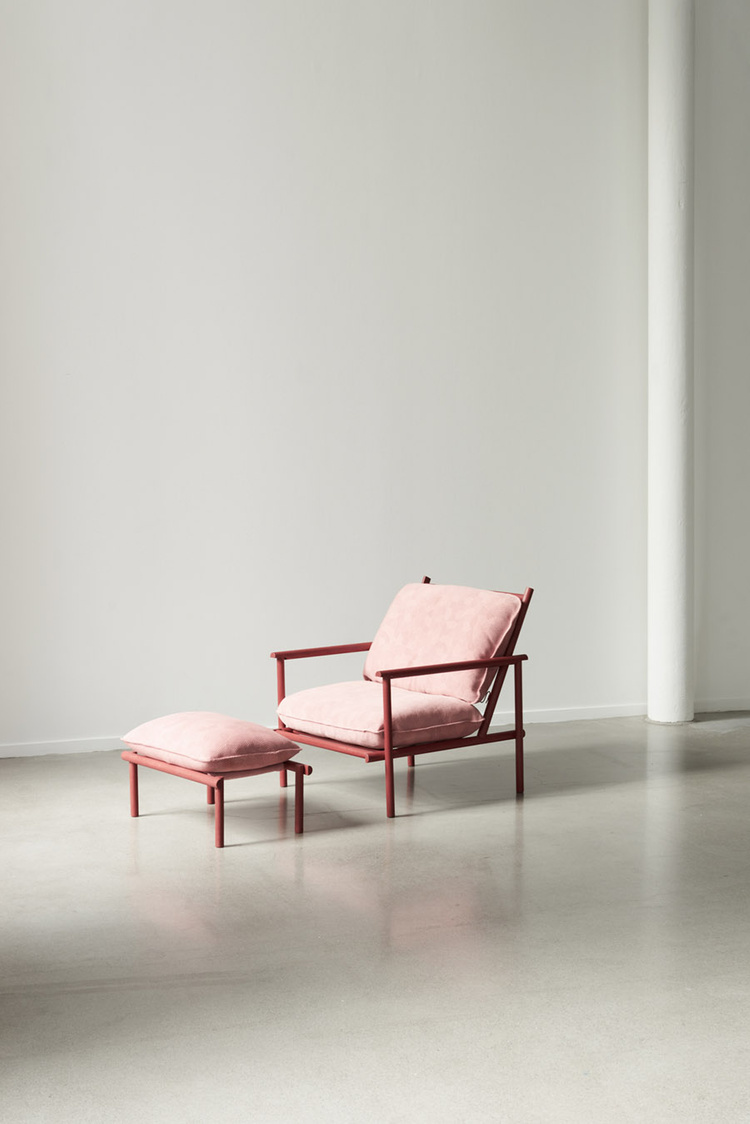 Unika Auction by Bjørn van den Berg and Falke Svatun — A molded plywood lounge chair and ottoman with burgundy-stained wooden frame, upholstered in pale pink linen fabric.