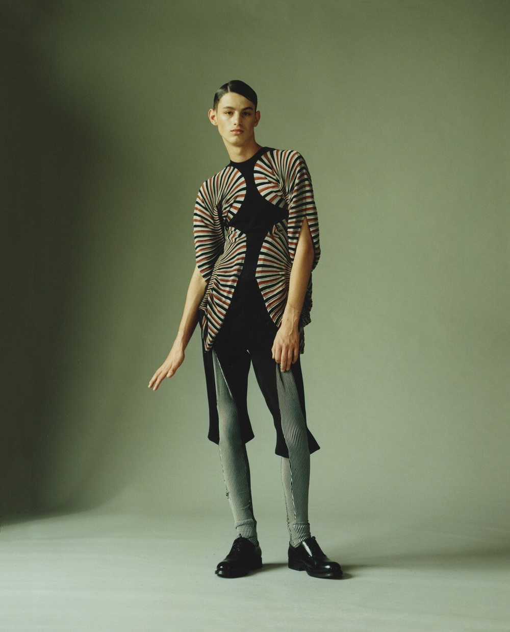 MA Collection by Martin Tual by Martin Taul — Martin Tual's MA Collection presents a geometric silhouette through contrasting textiles and deliberate posture.