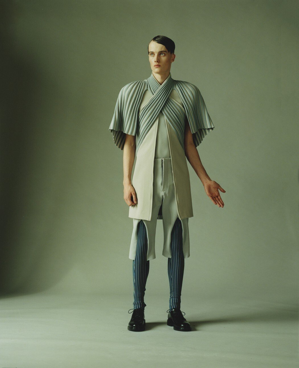 MA Collection by Martin Tual by Martin Taul — Martin Tual's MA Collection presents a deconstructed silhouette constructed from contrasting knit textures and geometric layering.