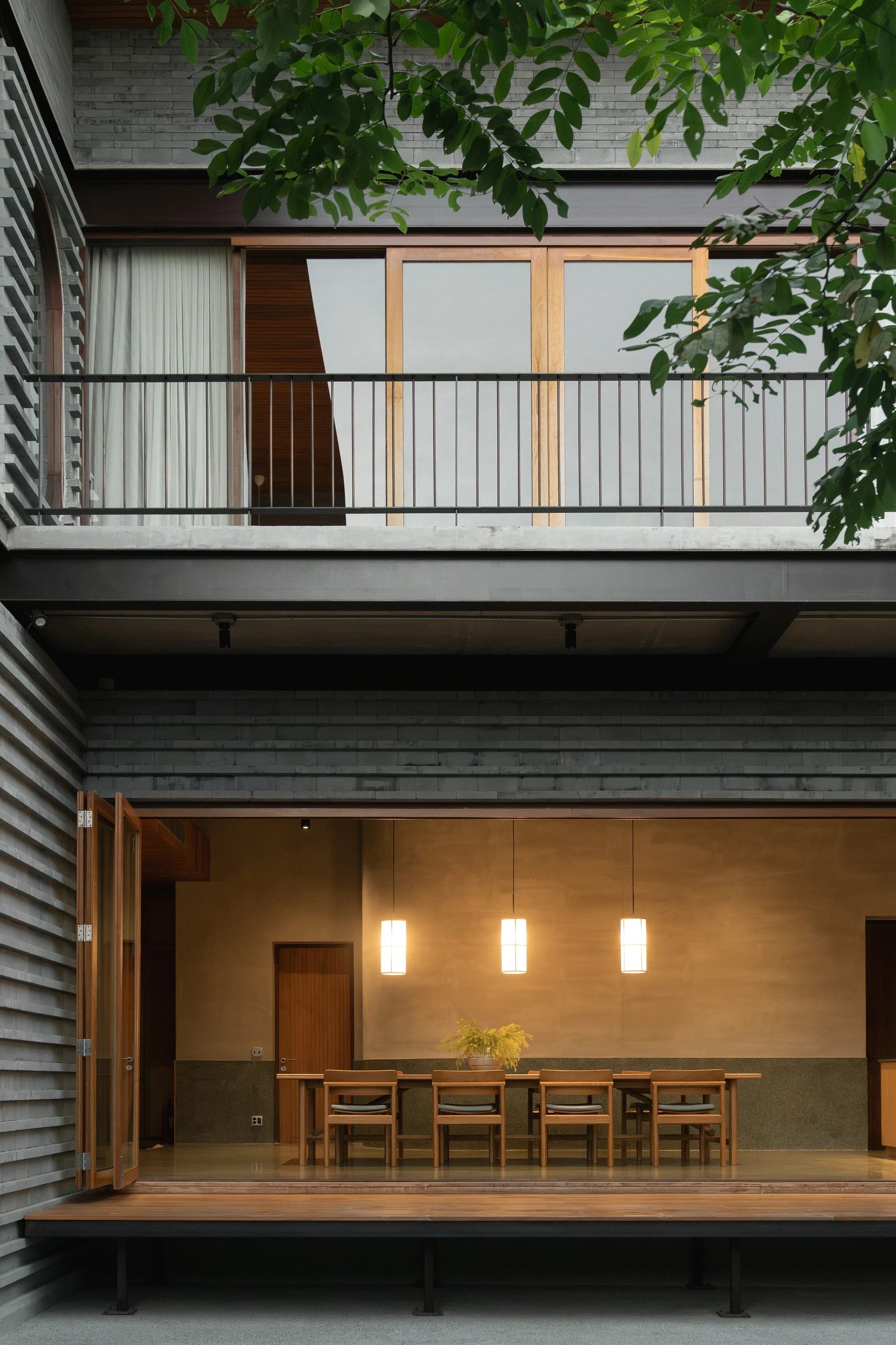 H168 House by Only Human, Bangkok Thailand, Chinese spatial traditions, dark grey brick, courtyard, moon gate