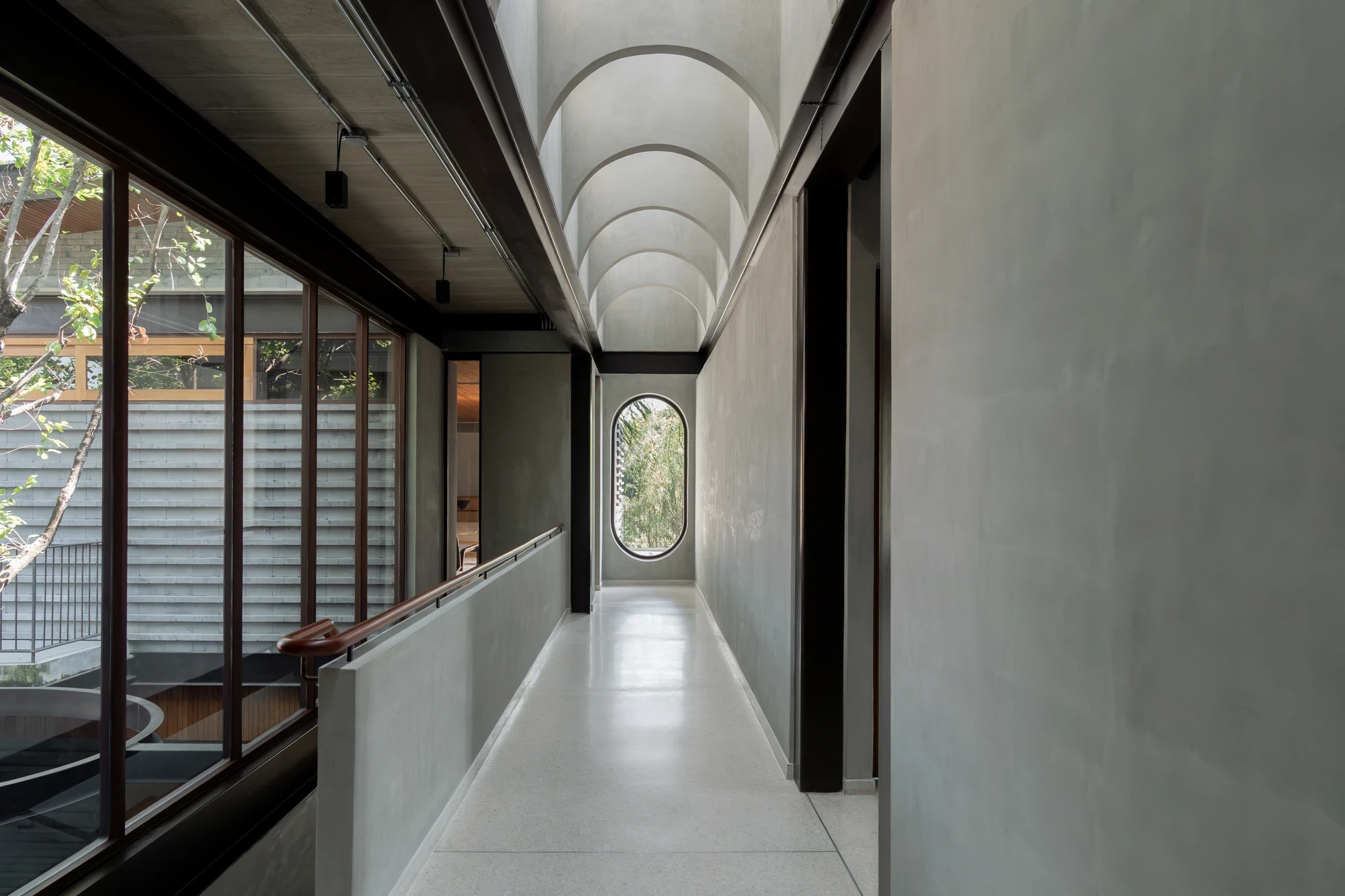 H168 House by Only Human, Bangkok Thailand, Chinese spatial traditions, dark grey brick, courtyard, moon gate