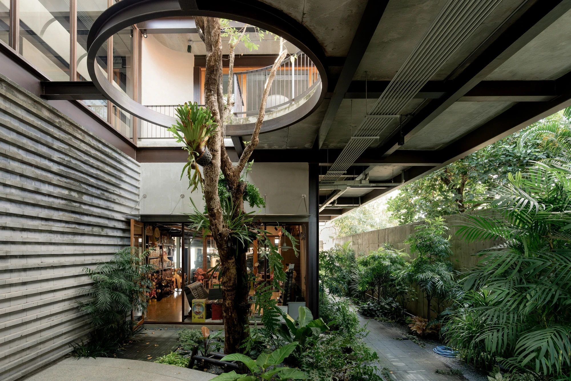 H168 House by Only Human, Bangkok Thailand, Chinese spatial traditions, dark grey brick, courtyard, moon gate