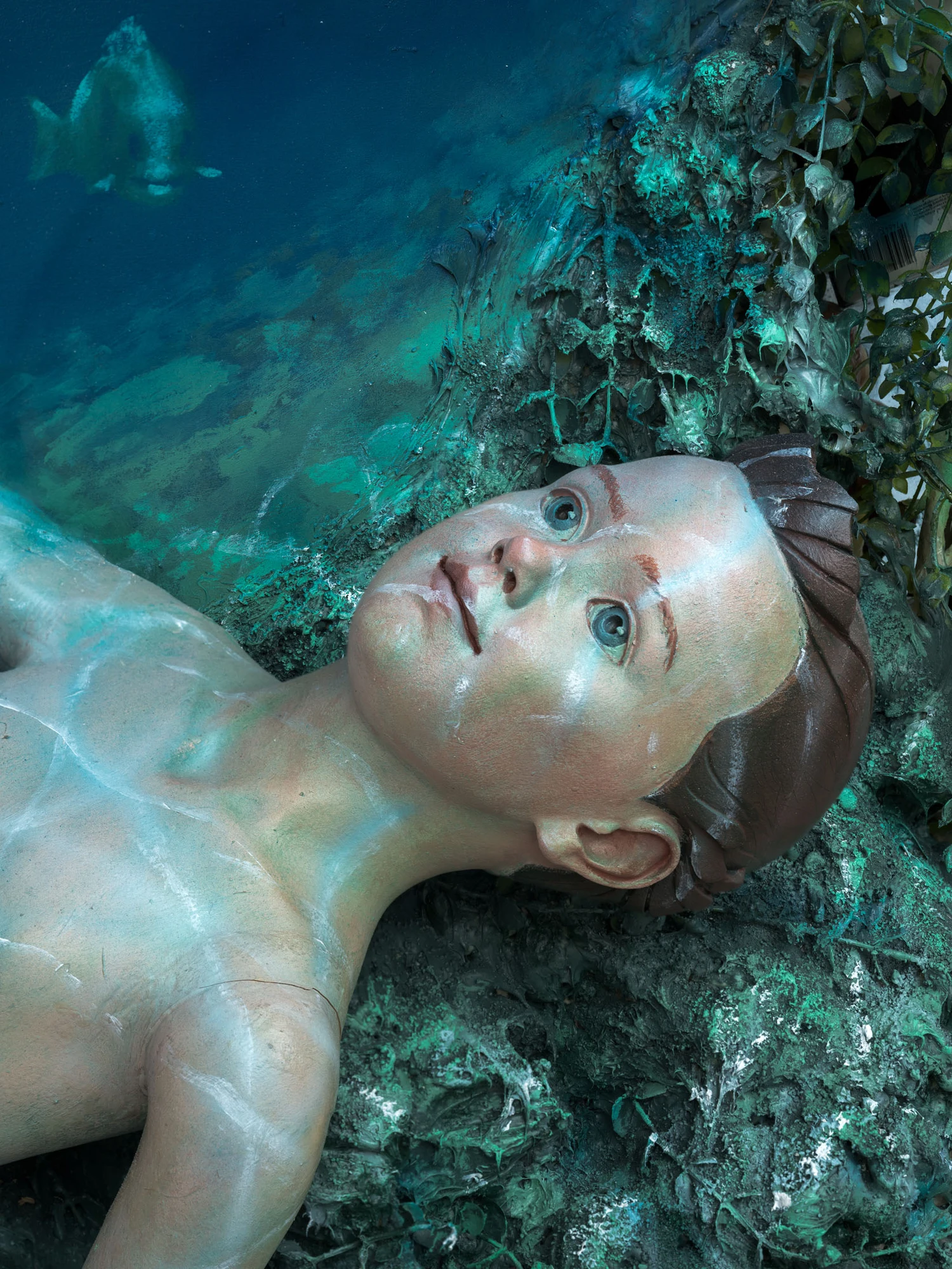 Cold Front by Trey Abdella at Kraupa-Tuskany Zeidler — Underwater photograph of a plaster cast human head and torso mounted against an encrusted metal shipwreck surface.