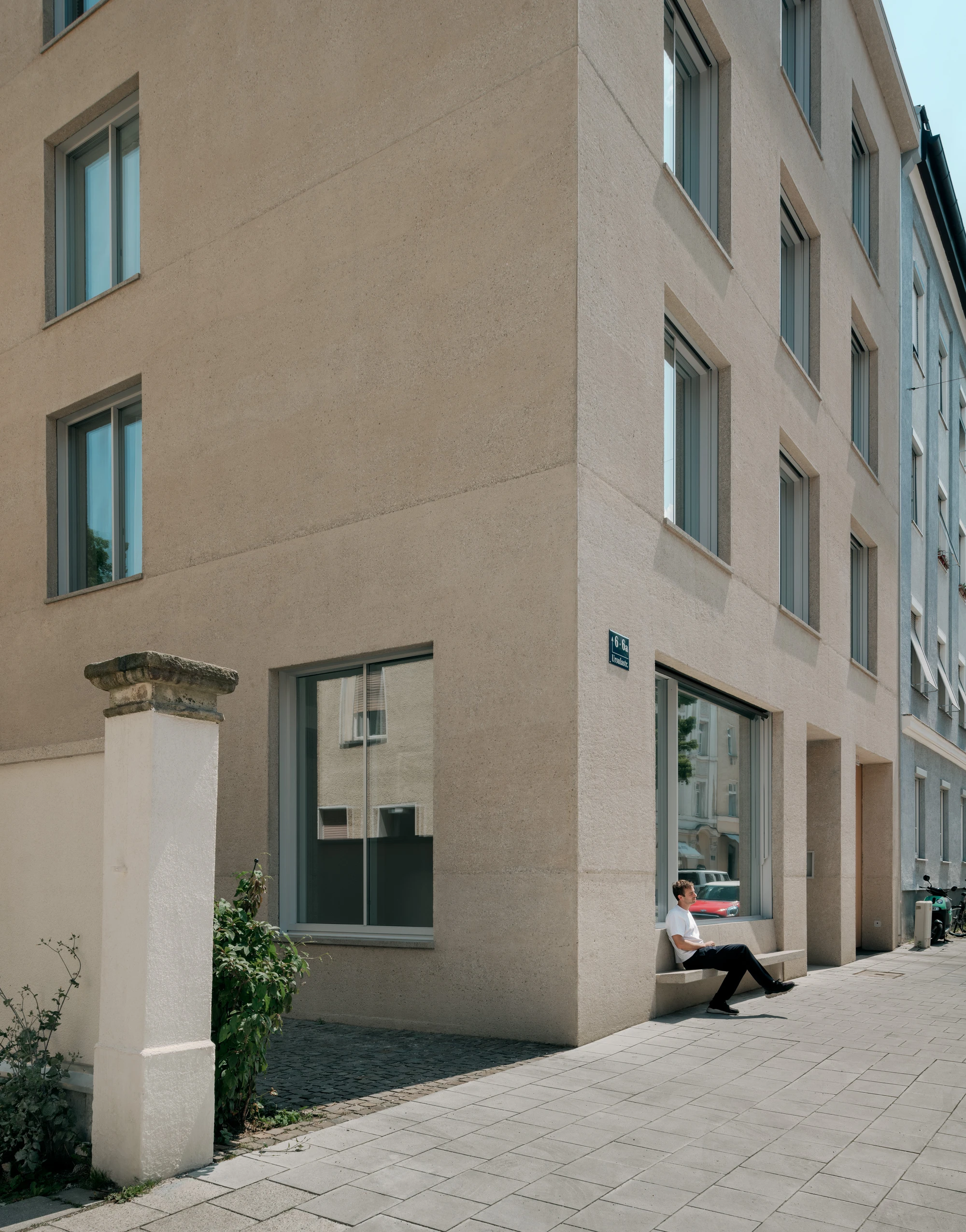 Ursulastraße 6 by Studio Mark Randel — A corner threshold of the renovated Ursulastraße 6 reveals the project's careful material articulation.