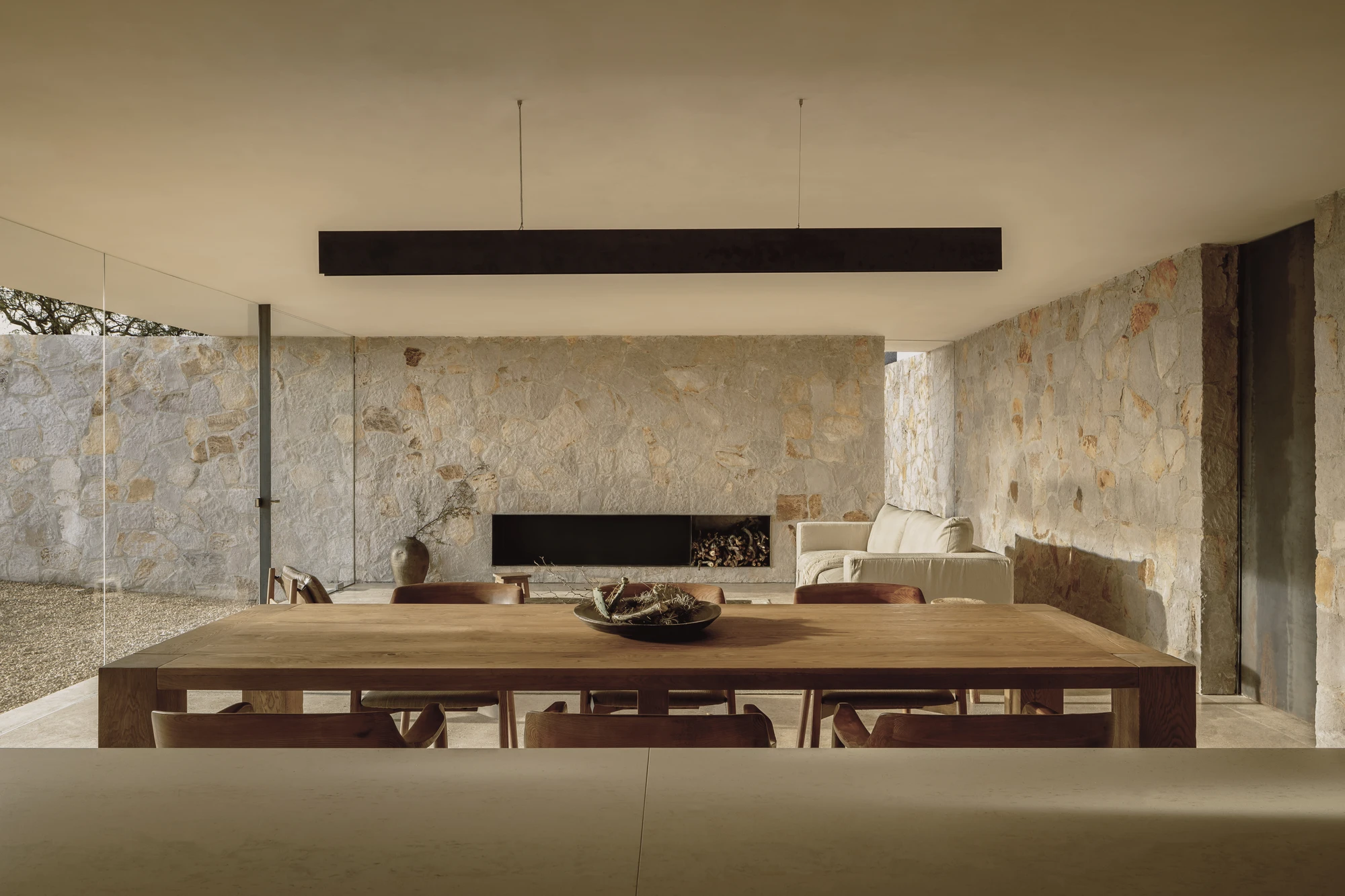 Enso House II by HW Studio — A cruciform residence interior captured from the dining threshold, revealing HW Studio's spatial organization principle.