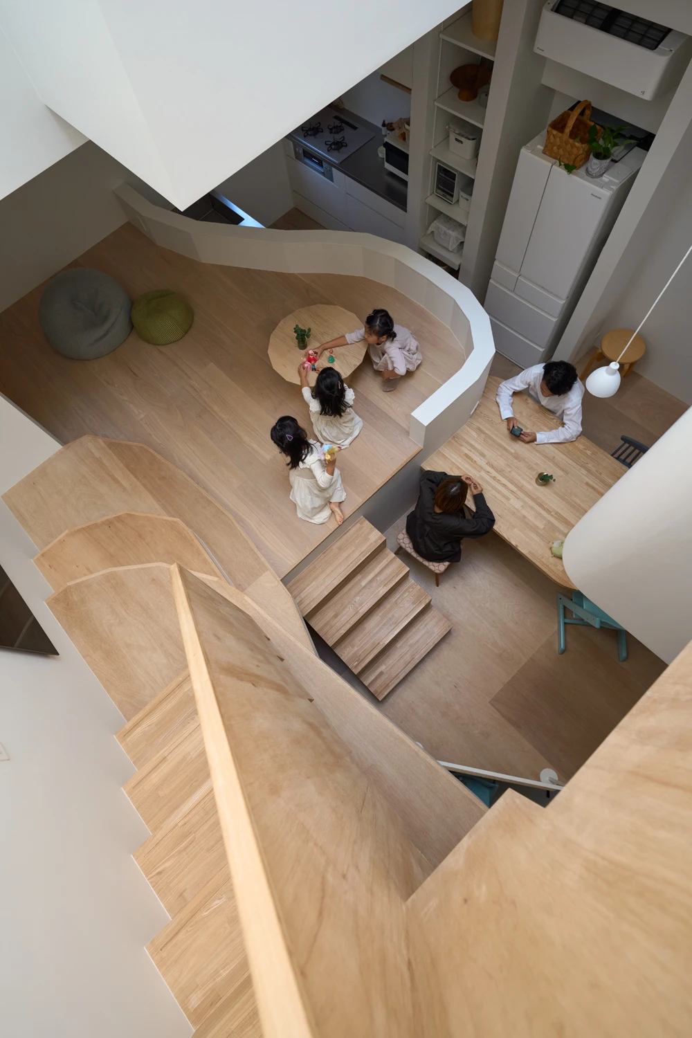 House in Hirano by Fujiwaramuro Architects — Aerial view into House in Hirano reveals the family inhabiting the constrained flagpole lot.