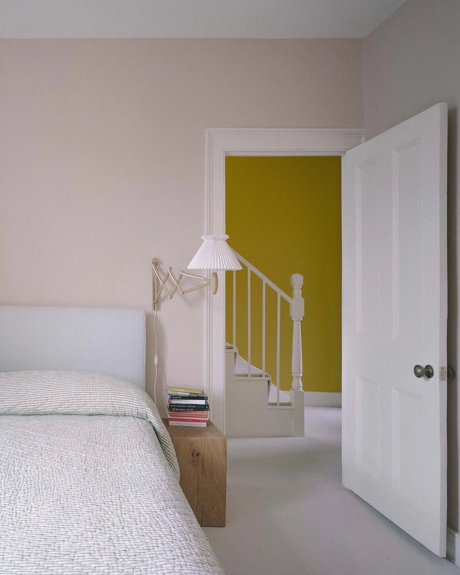 Barnsbury House by Architecture for London — A bedroom passage reveals layered spatial organization within the Grade II listed Georgian townhouse.