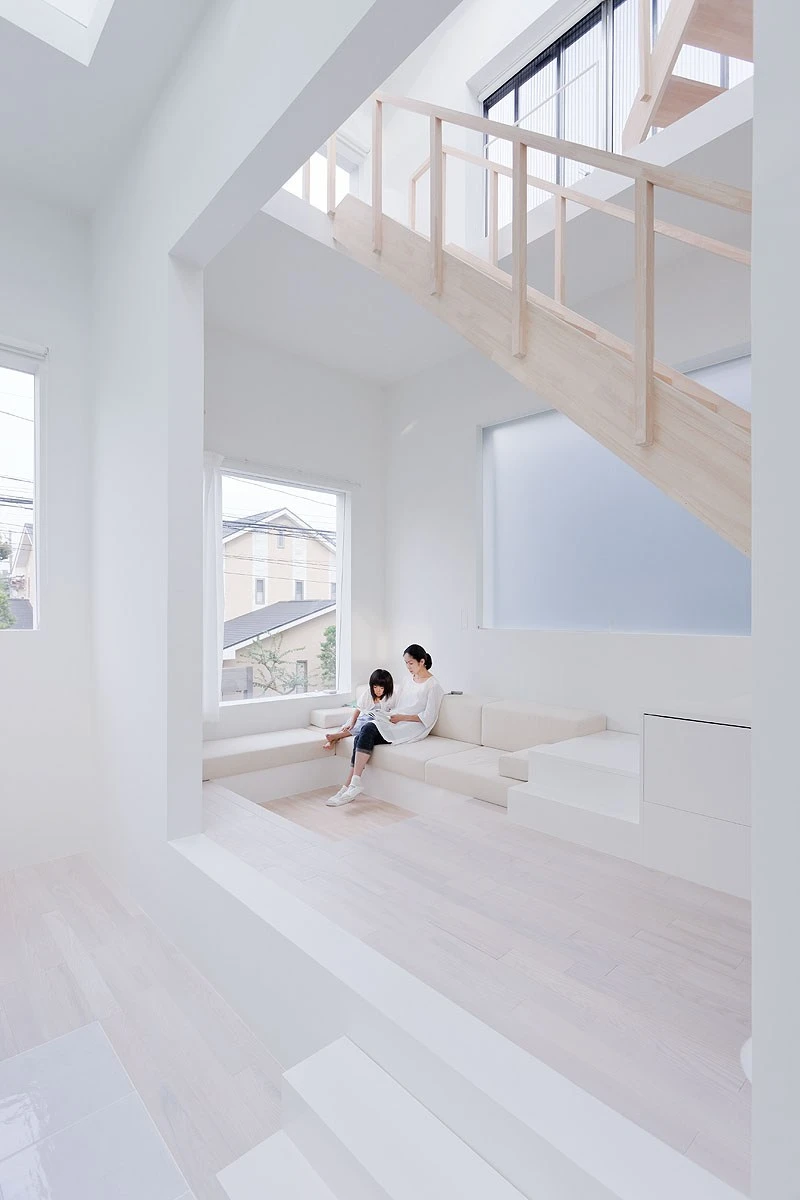 House H by Sou Fujimoto Architects — A vertical domestic interior captured from an elevated vantage point reveals the porous spatial logic of House H.