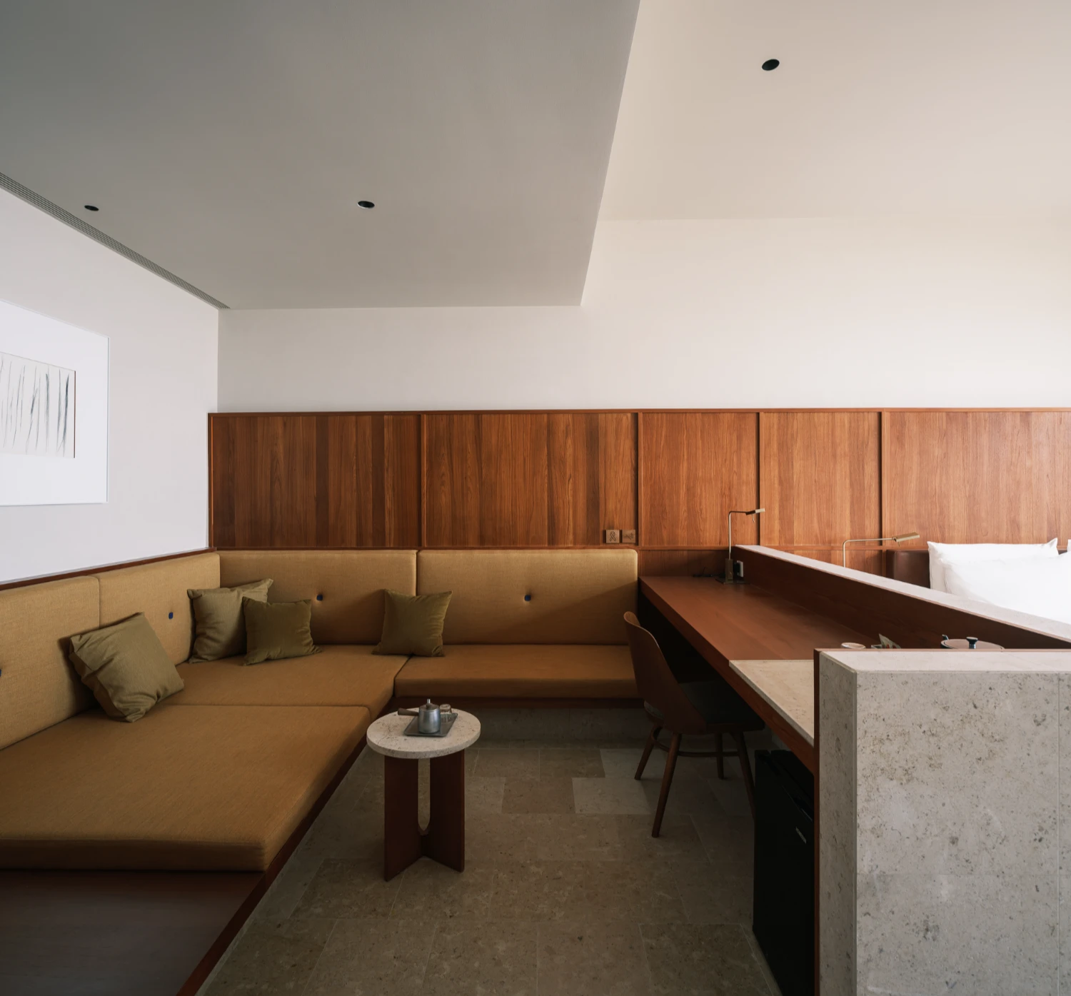 Lost Villa Shengsi Huanglong Island Lighthouse Hotel by SZ-Architects — A hotel suite interior demonstrates material restraint through contrasting zones.