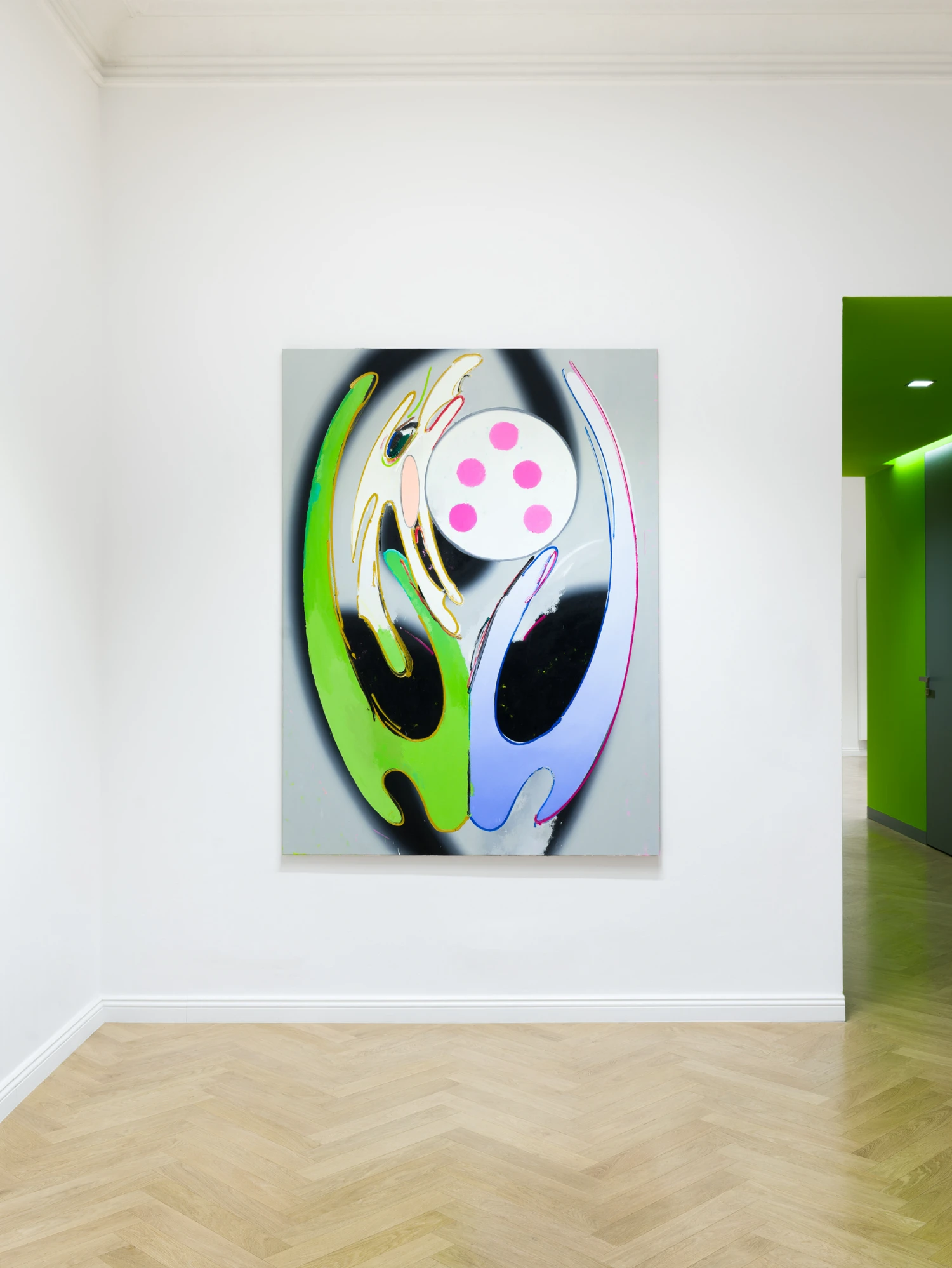 Bloom by Tomáš Absolon Milan Vagač at SPOT Gallery — A wall-mounted canvas dominates the gallery's white plaster expanse, depicting two stylized hands in neon green and electric blue reaching toward a white...