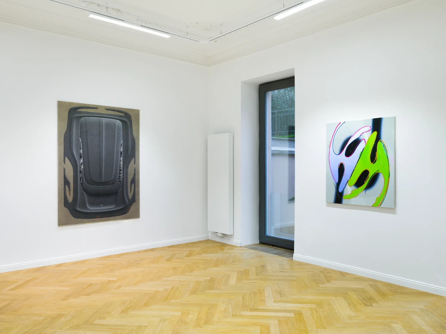 Bloom by Tomáš Absolon Milan Vagač at SPOT Gallery — A gallery corner displaying two artworks in contrasting visual registers.