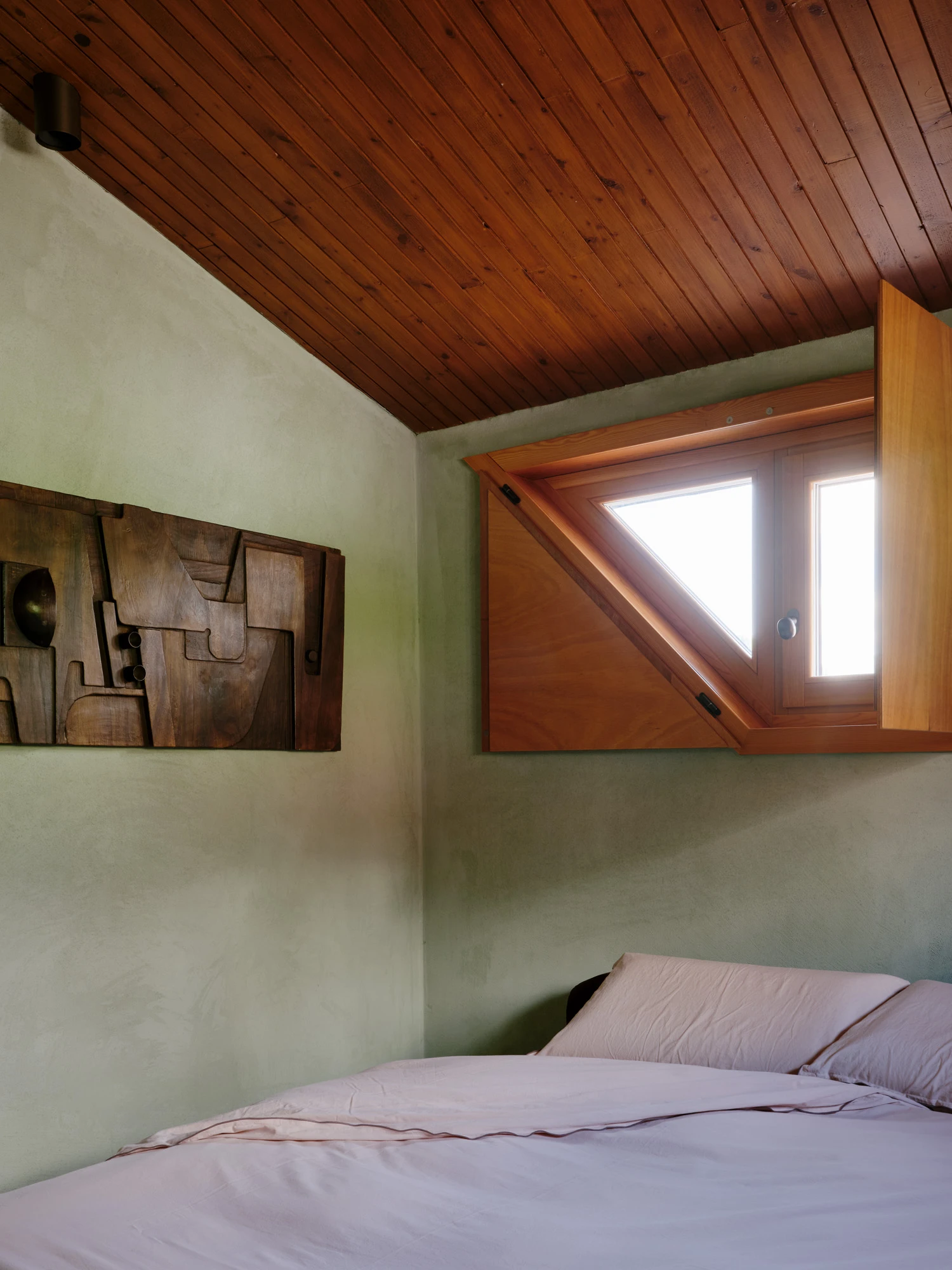 An Interior at Giomein by co.arch — A bedroom alcove stripped to essential geometry.