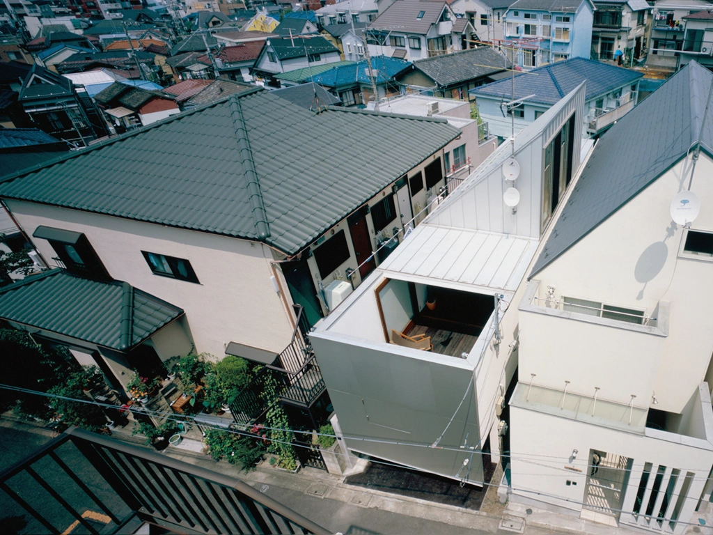 Long Tall House by Spacespace — Aerial view of Long Tall House reveals the compressed vertical strategy responding to its constrained Tokyo site.