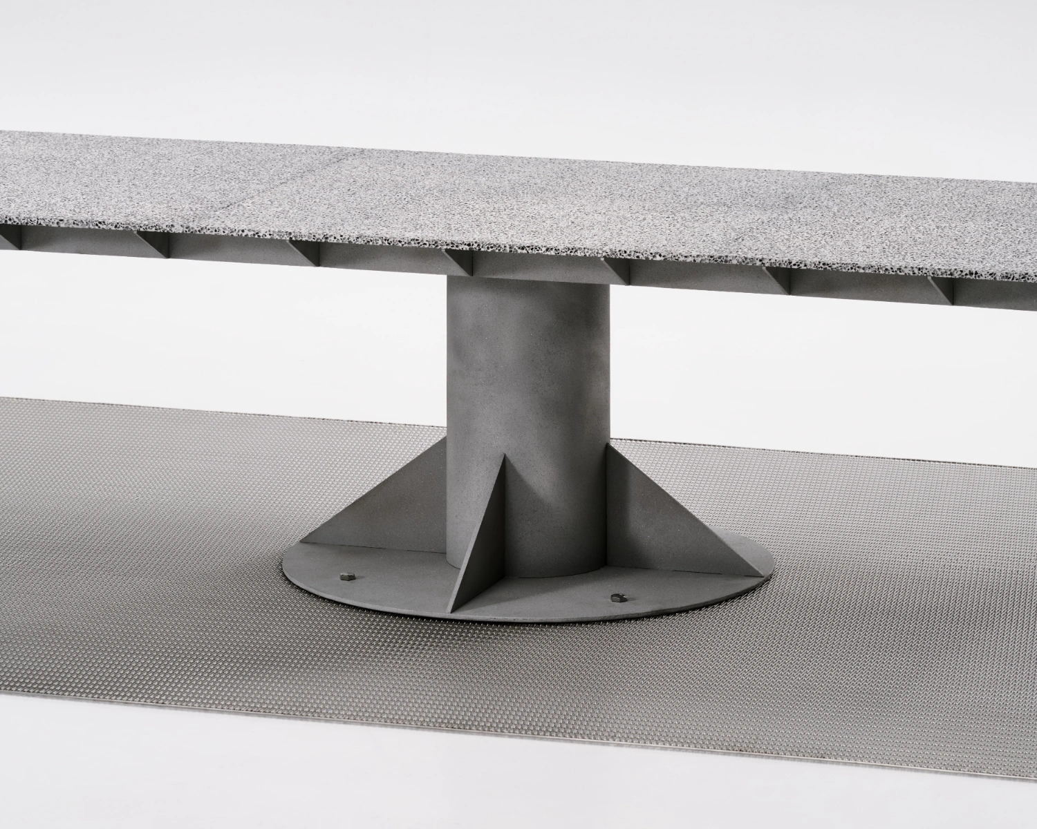 M.I.G. Store by AVOIR — A sculptural concrete pedestal anchors the M.I.G.