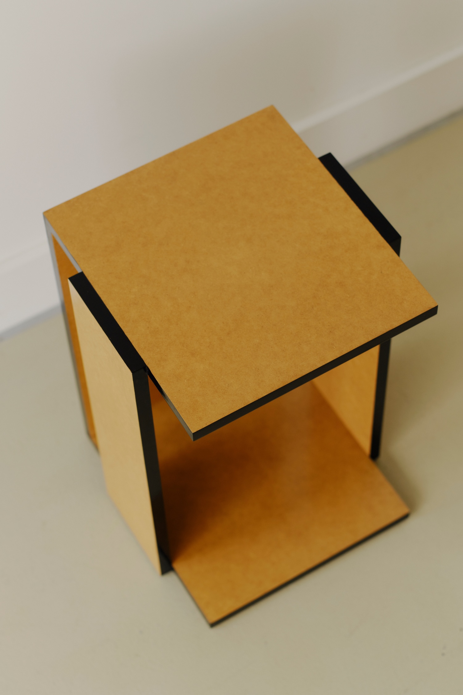 Undressed Collection by Georgina Davies — A cubic shelving unit from the Undressed Collection demonstrates Davies' material transparency through exposed MDF construction.