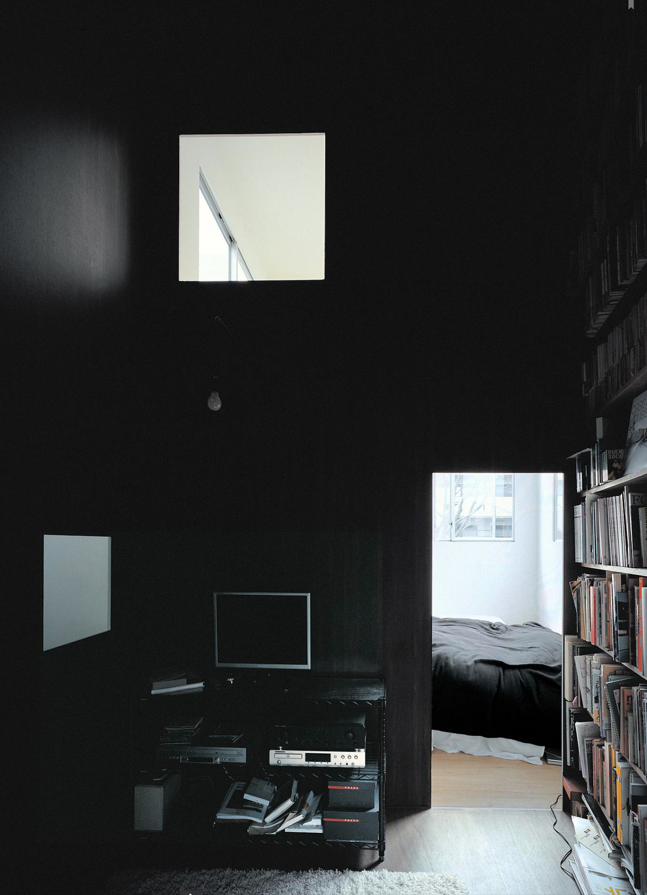 House in a Plum Grove by Kazuyo Sejima by Kazuyo Sejima & Associates — This interior view reveals the spatial compression at the heart of Sejima's design.