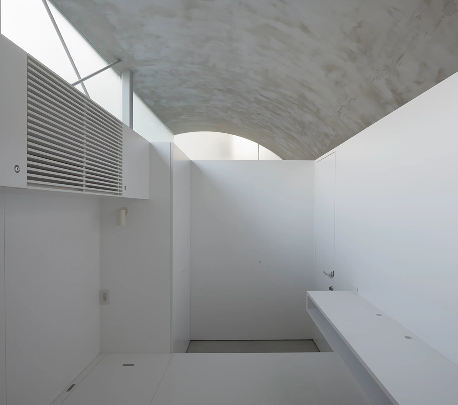 Tunnel House by Makiko Tsukada Architects — Interior view of the bathroom tunnel, revealing the architectural intervention at full scale.