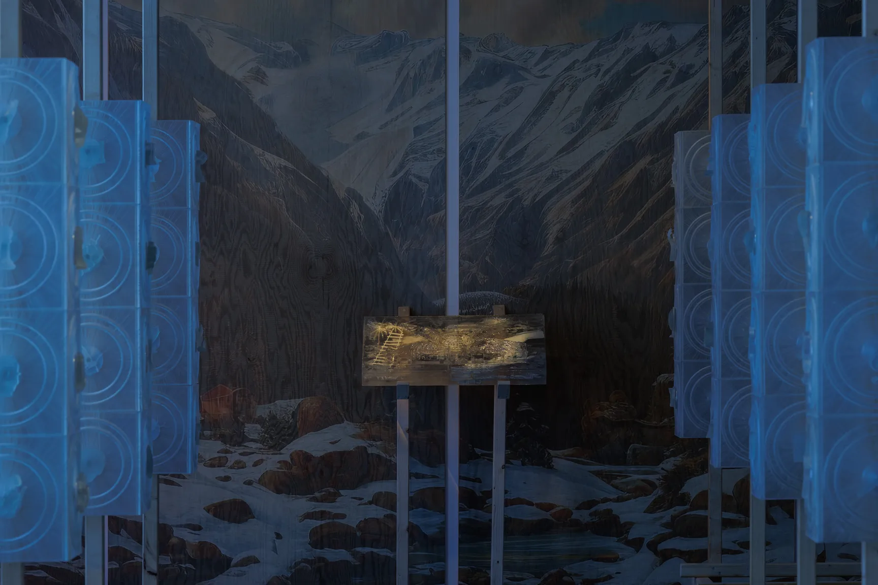 Starmirror by Holly Herndon & Mat Dryhurst at KW Institute for Contemporary Art — Within the KW Institute's Starmirror installation, this view frames a mountainous landscape backdrop visible through expansive glazing, layered behind...