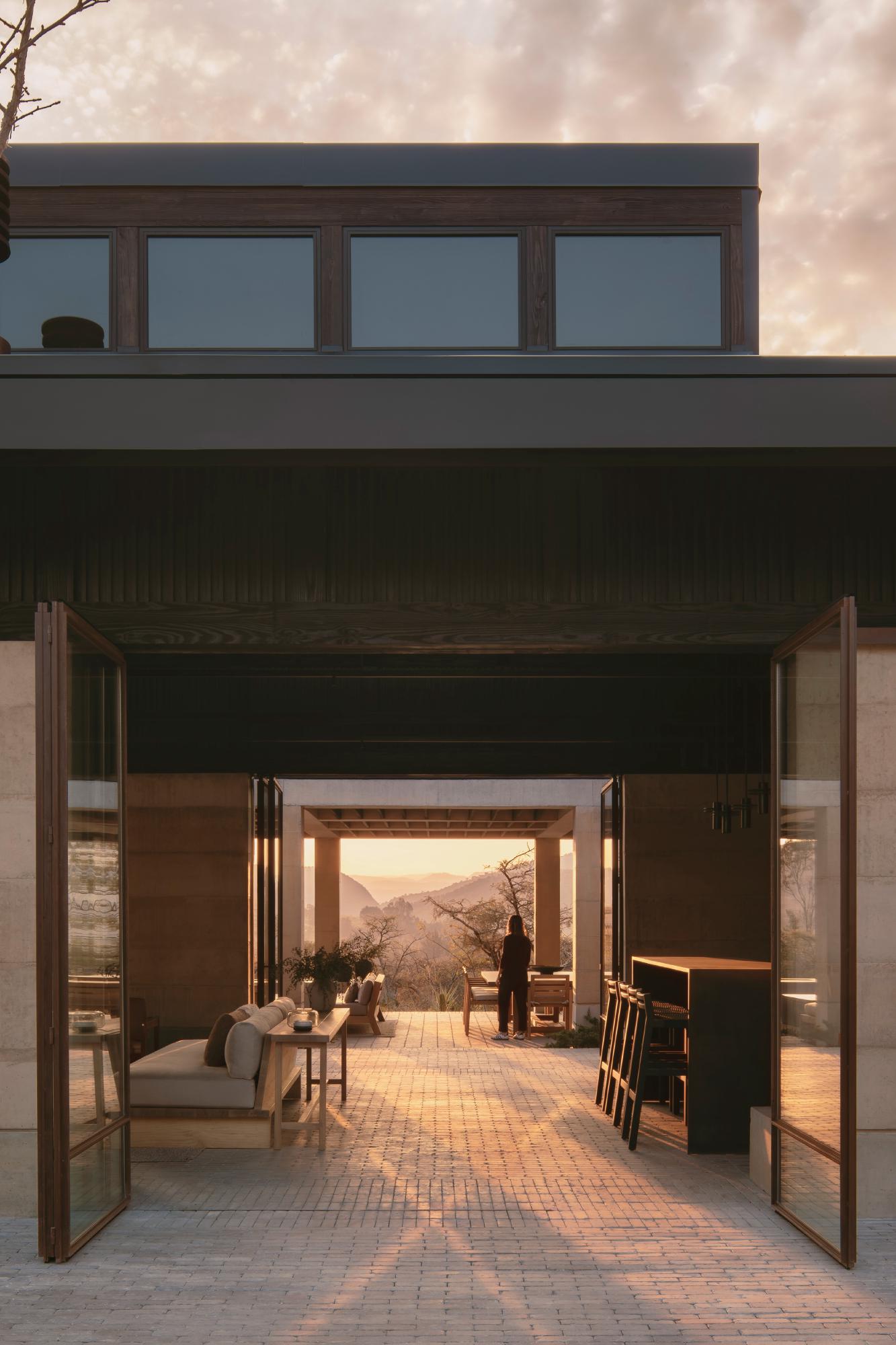 Casa el Espino by Soler Orozco Arquitectos — Casa el Espino's threshold captures the house as a permeable boundary between interior and landscape.