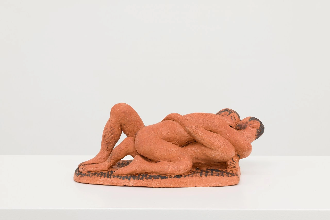 La scorza by Louis Fratino at Galerie Neu — A terracotta figurative sculpture depicting a reclining male nude in a languid, recumbent pose.