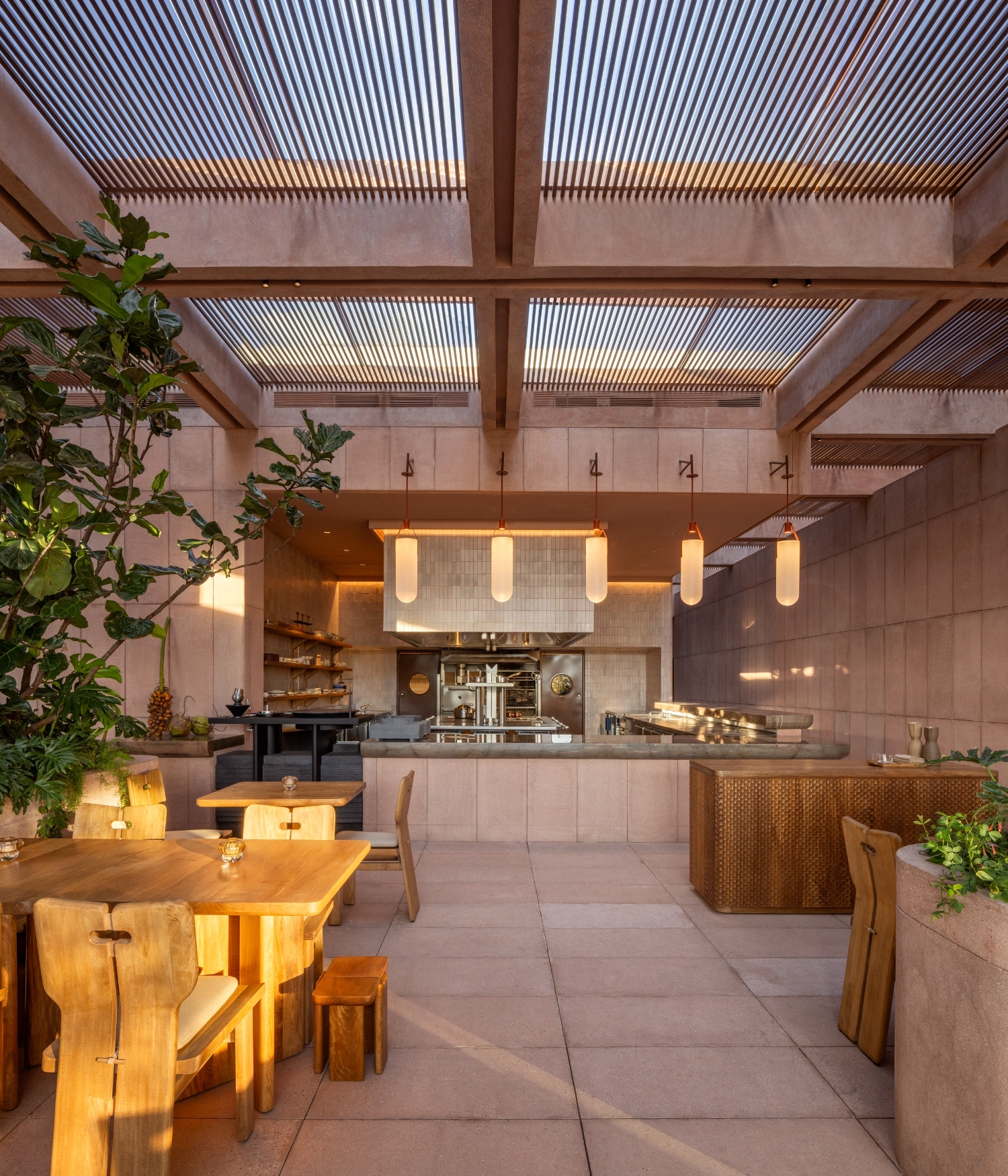 Rubra Restaurant by Ignacio Urquiza + Ana Paula de Alba — The dining terrace of Rubra Restaurant showcases a carefully orchestrated material palette in warm earth tones.