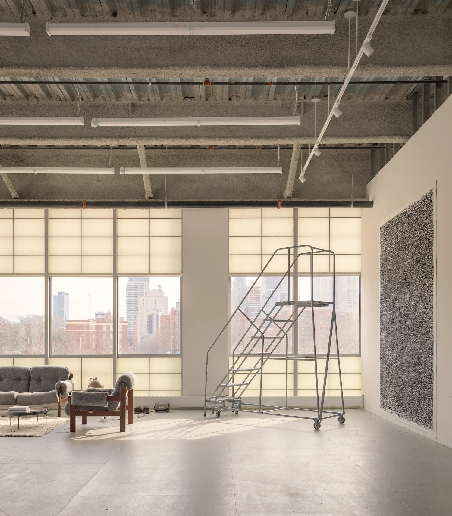 Glenn Ligon Artist’s Studio by Ravi Raj Architect — A 8,000-square-foot artist's studio flooded with diffused light through a gridded window wall of industrial steel framing.