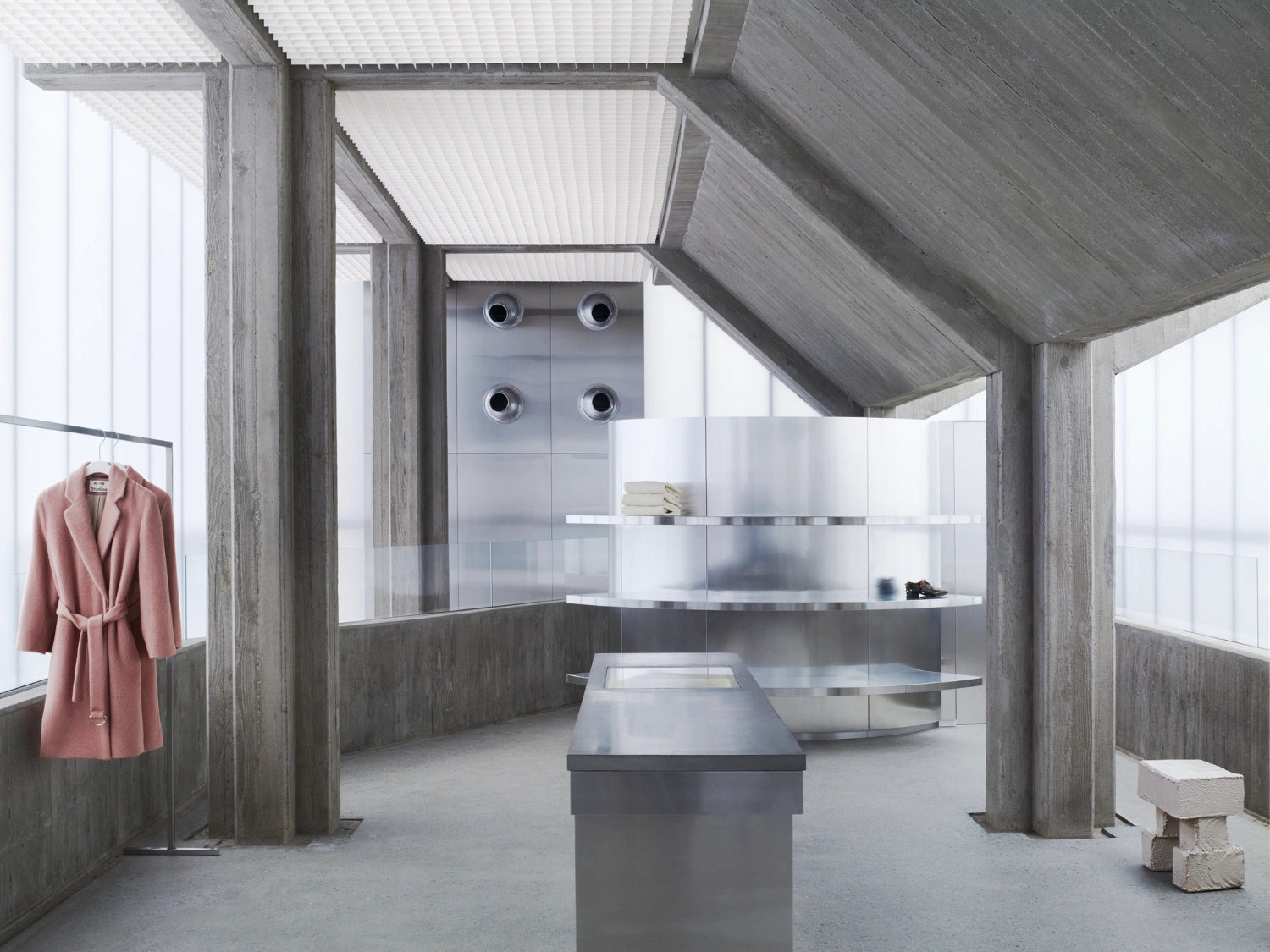 Acne Studios Cheongdam by Sophie Hicks Architects — Interior view of the Acne Studios retail space designed by Sophie Hicks Architects, revealing the spatial arrangement behind the translucent polycarbonate...