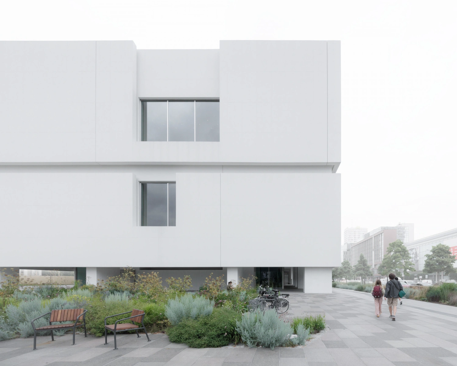 Museum of Modern Art in Warsaw by Thomas Phifer — The ground-level courtyard of the Museum of Modern Art reveals Thomas Phifer's stacked concrete volumetry from an intimate vantage point.