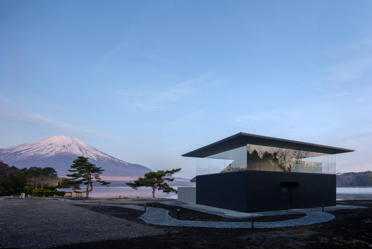 CYCL by YŪ Momoeda Architects — CYCL presents itself as a geometric counterpoint to Mount Fuji's snow-capped form across Yamanakako Lake.