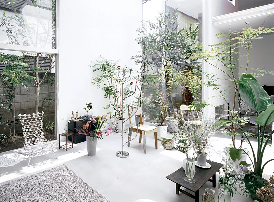House A by Ryue Nishizawa — A sectional view through House A's central courtyard reveals the architect's strategy of fragmented volumetric composition.