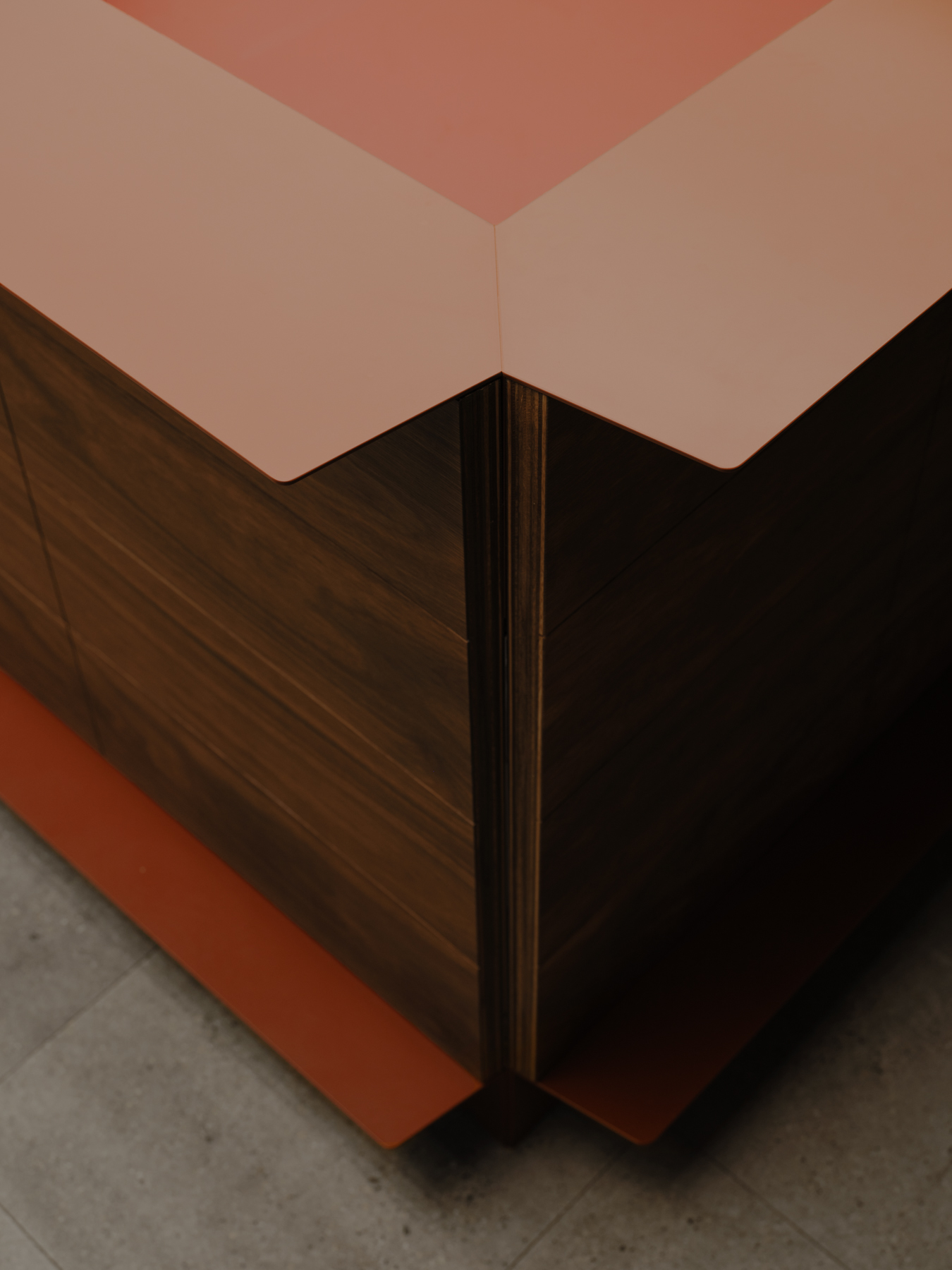 Palace Coffee by KKAP — This close-up detail captures the constructional spine of Palace Coffee's storefront—a dark timber-clad mullion bisecting the recessed entry threshold.