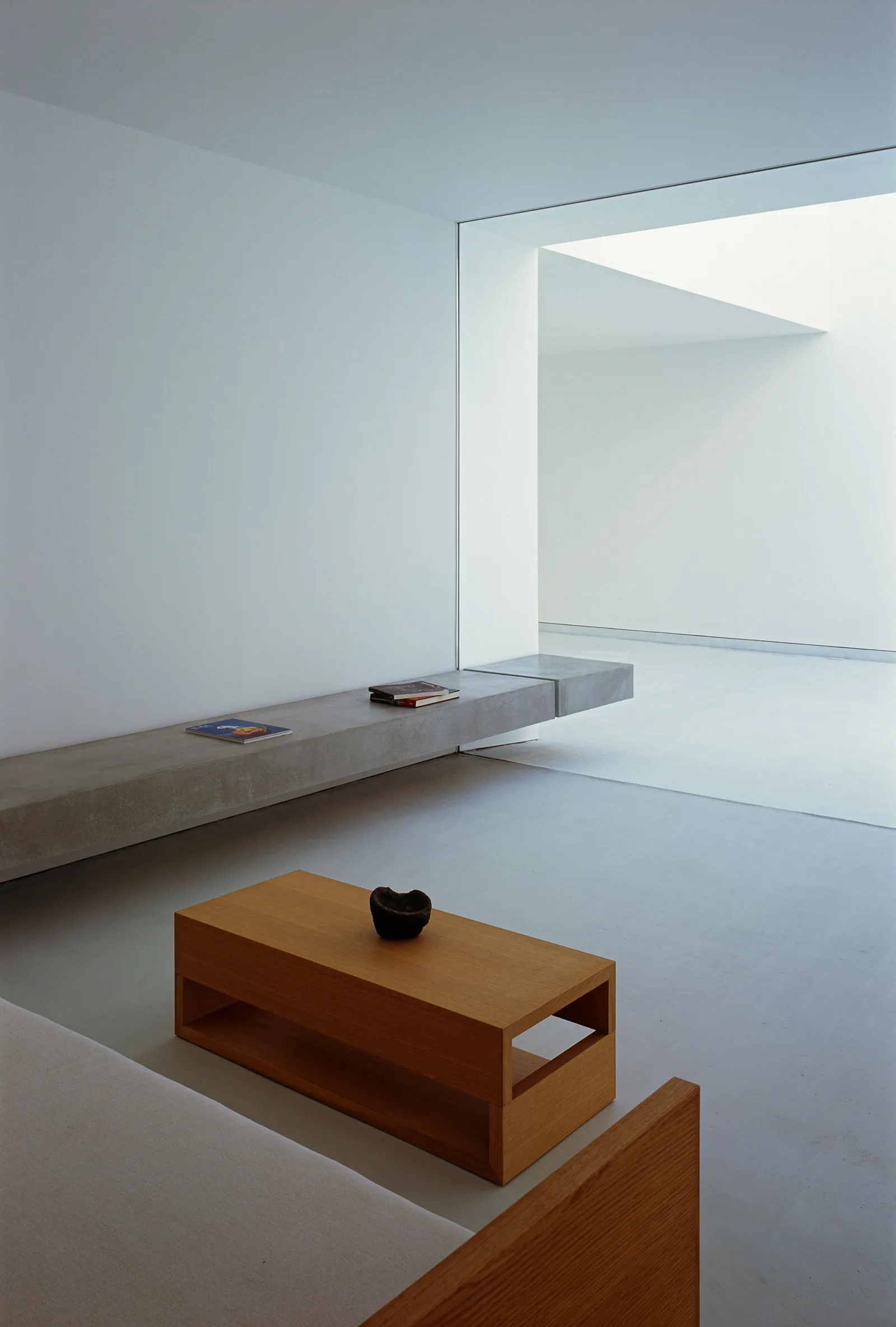 White Cave House by Takuro Yamamoto — Interior passage of White Cave House photographs the spatial interstice created by the recessed void.
