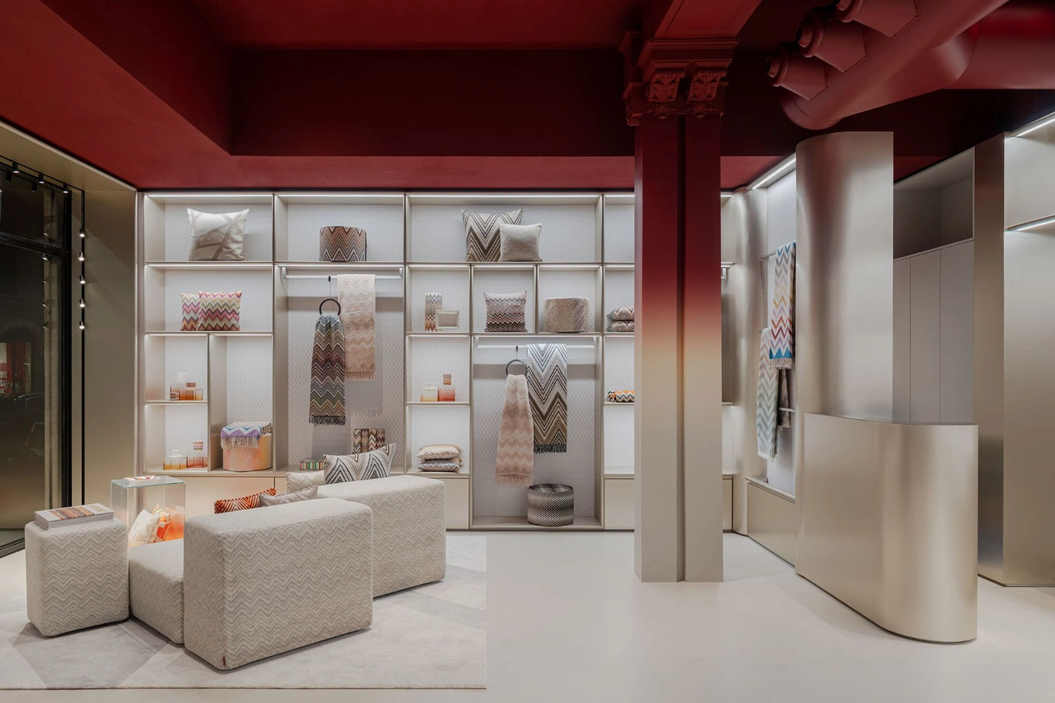 Missoni Home Boutique (Showroom) by Lit Studio — The Missoni Home showroom presents a symmetrically organized retail interior anchored by a tapered neutral column.
