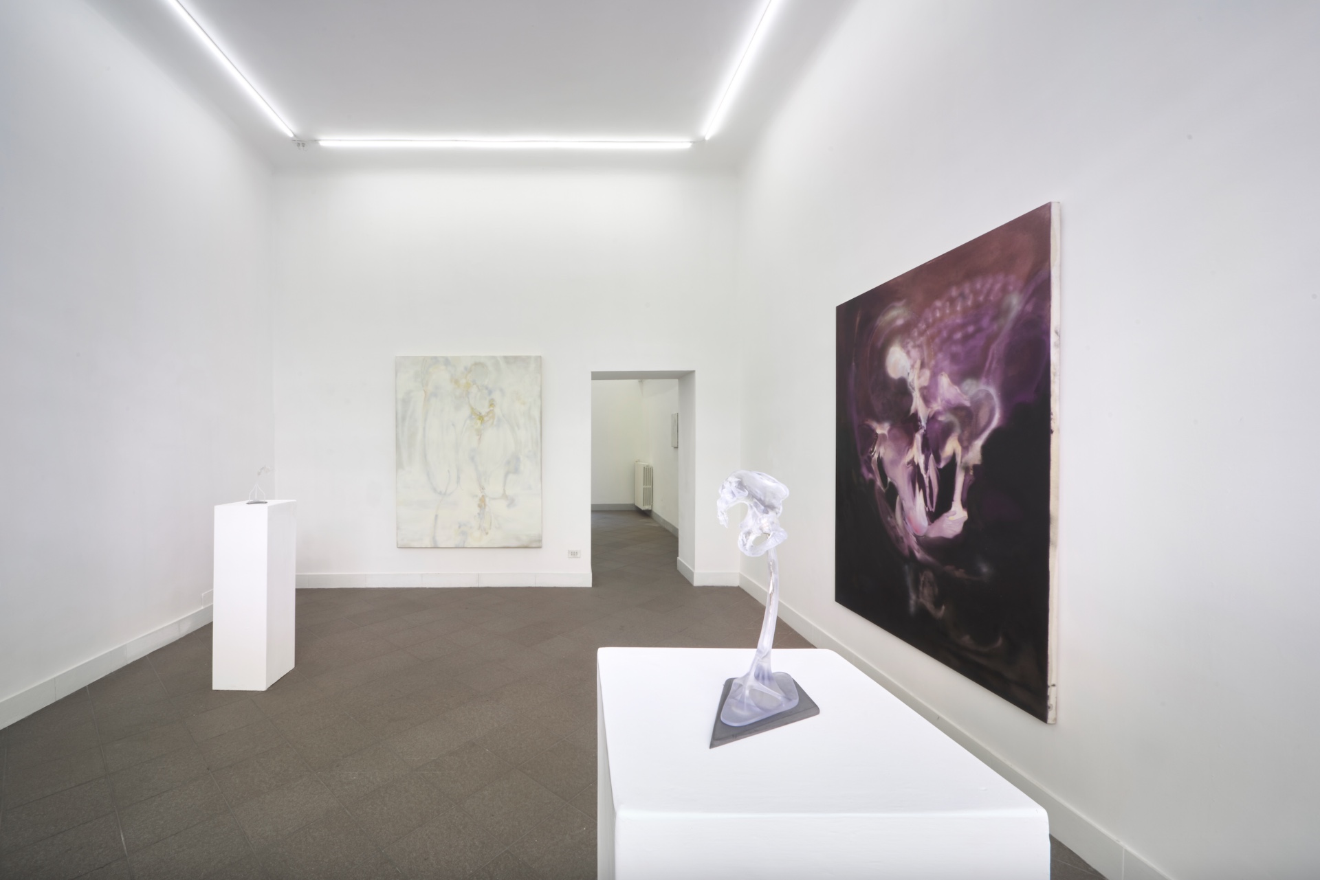 Opacity As A Healing Space by Szilvia Bolla Lorenzo Conforti at Limbo Contemporary — A translucent resin sculpture with undulating biomorphic form dominates the foreground, mounted on a raw concrete plinth.