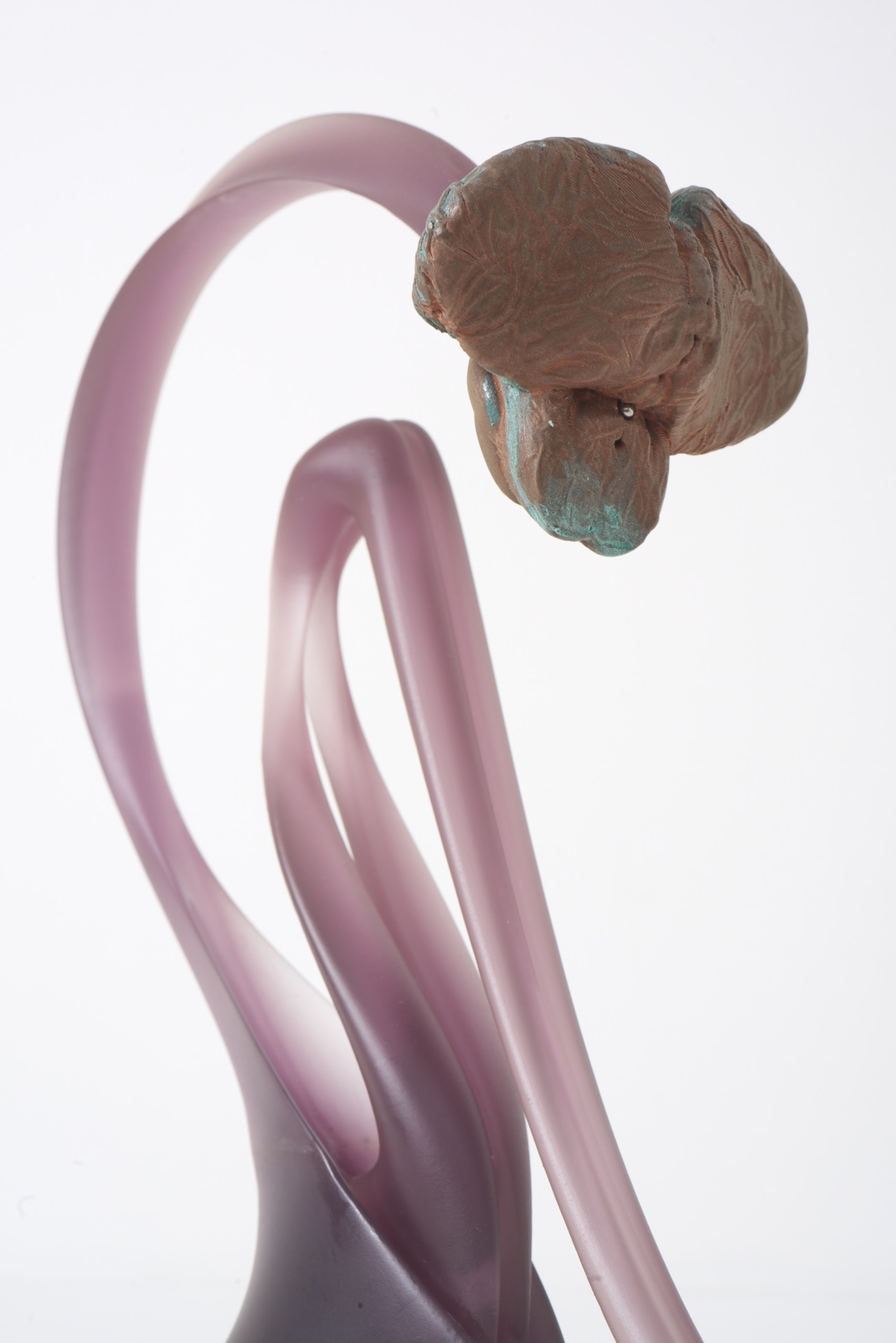 Opacity As A Healing Space by Szilvia Bolla Lorenzo Conforti at Limbo Contemporary — A sculptural form in translucent resin with undulating, biomorphic curves that suggest fluid movement frozen mid-flow.