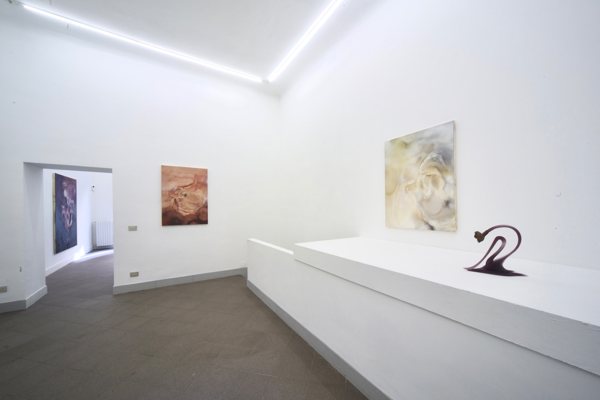 Opacity As A Healing Space by Szilvia Bolla Lorenzo Conforti at Limbo Contemporary — A gallery interior showcasing sculptural works within a minimalist white-walled space.