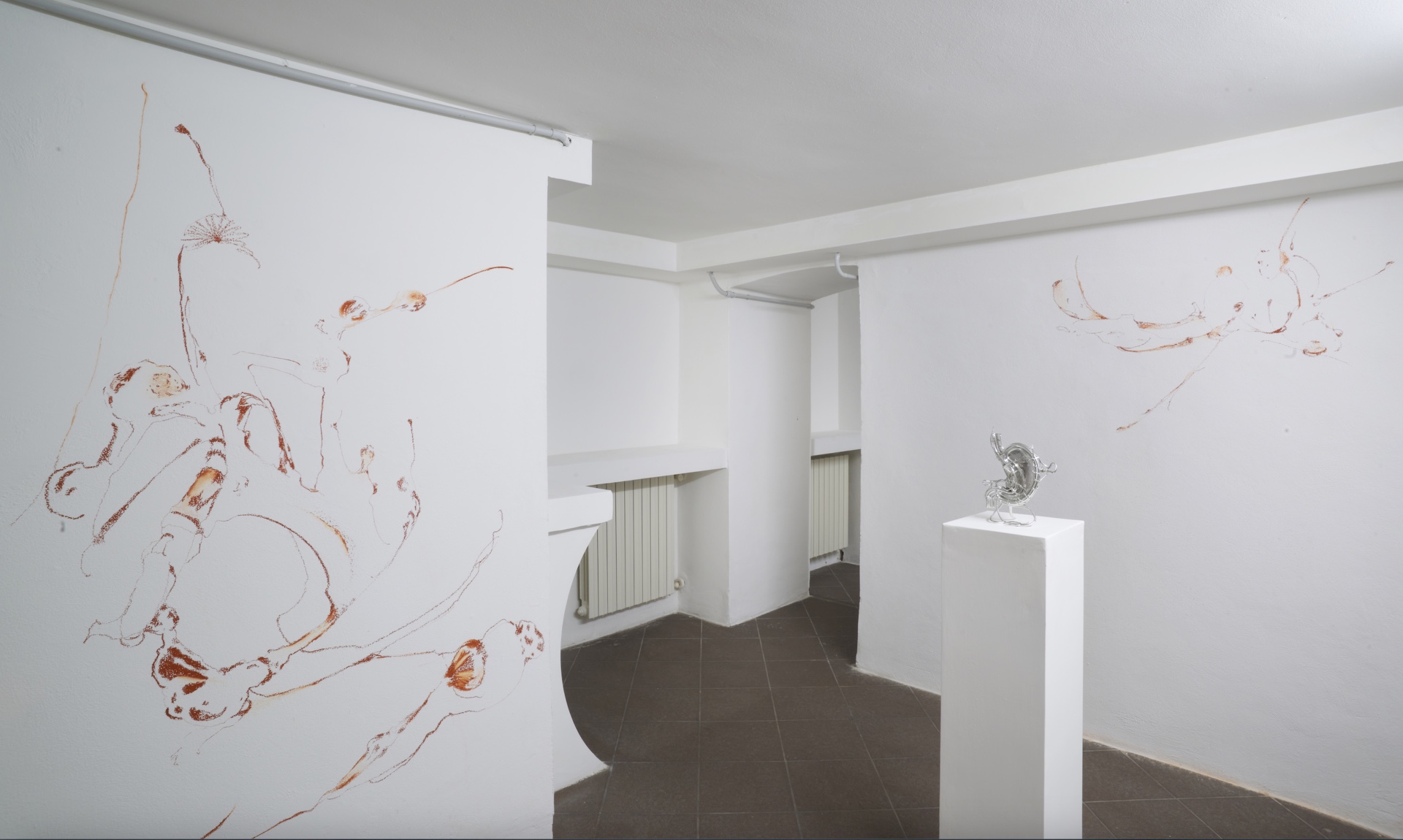 Opacity As A Healing Space by Szilvia Bolla Lorenzo Conforti at Limbo Contemporary — A white gallery interior displaying wall-mounted drawings executed in rust and terracotta pigments.