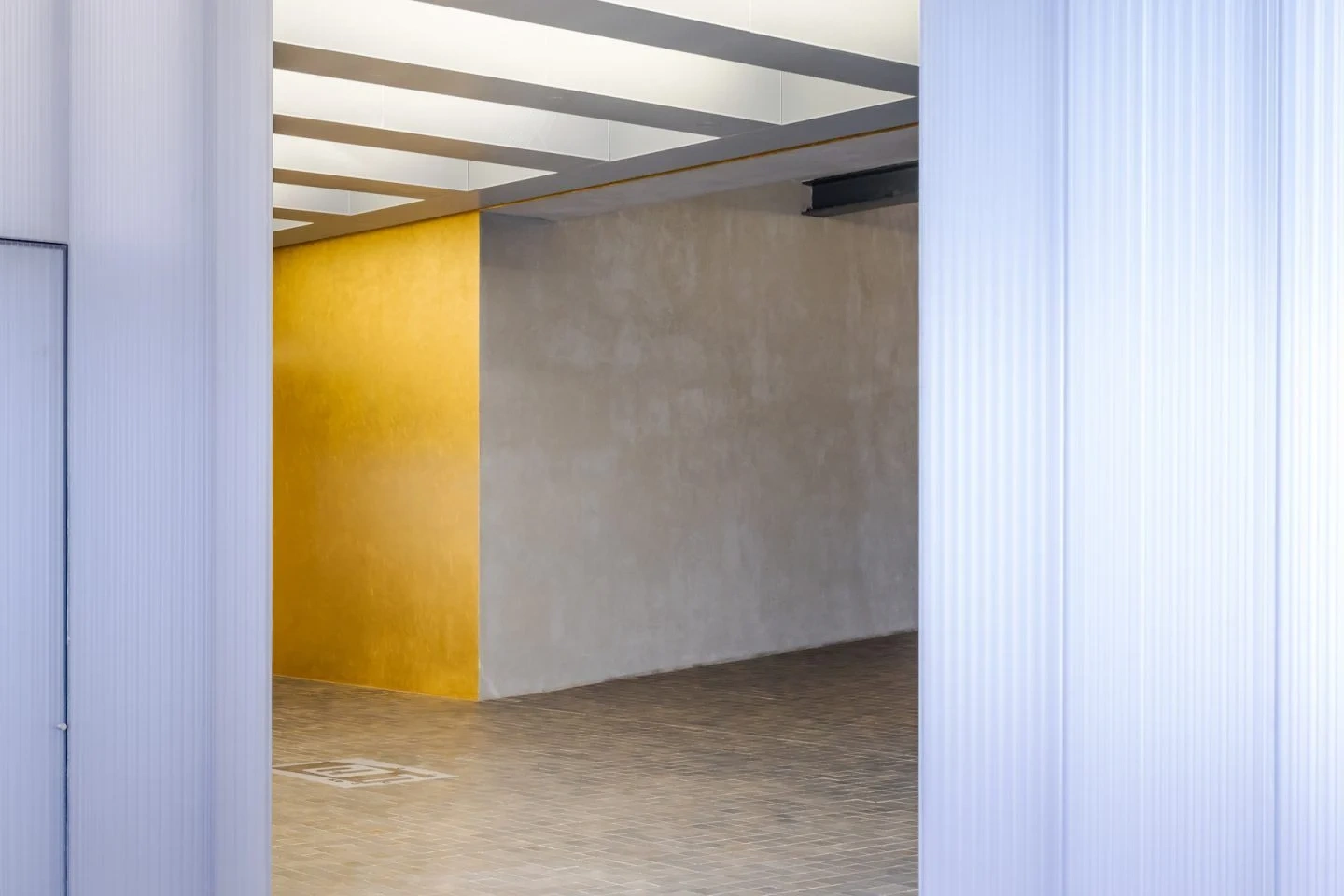 Fondazione Prada by OMA — A gallery interior showcasing OMA's spatial fragmentation strategy at Fondazione Prada.
