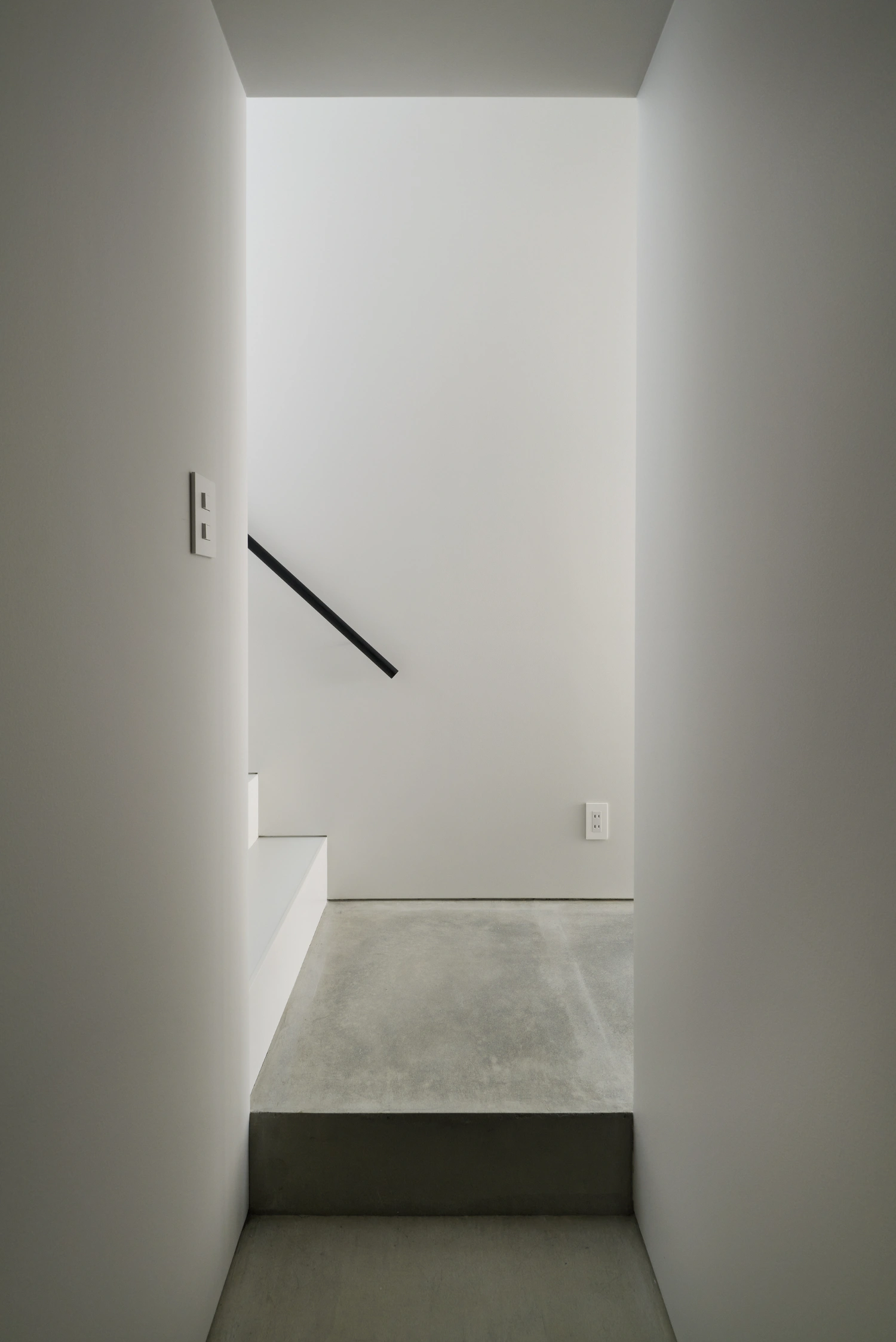 Retreat House by Arii Irie Architects — A narrow interior passage captures the compression central to this Tokyo residence.