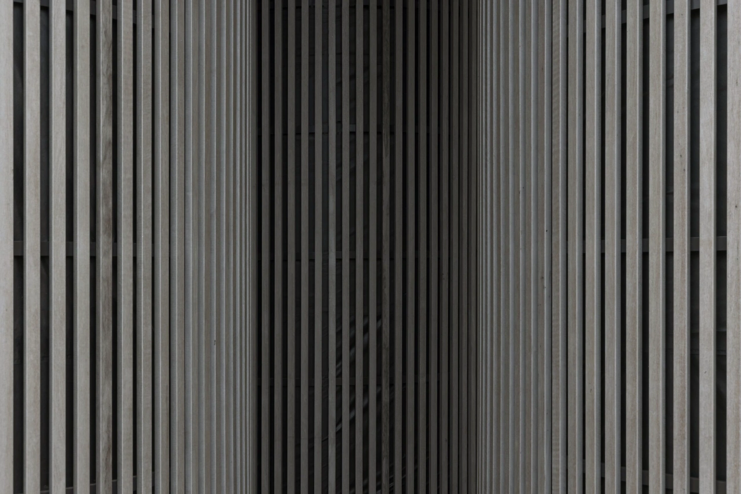 Dolmen by Space Encounters — Close-up detail of the vertical corrugated metal cladding that envelops Dolmen's structure.