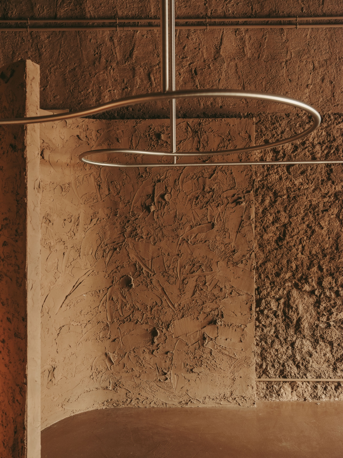 GN0 store by Cristina Cirera — A close-up detail of the GN0 store interior reveals the materiality of Cristina Cirera's Mars-inspired design.