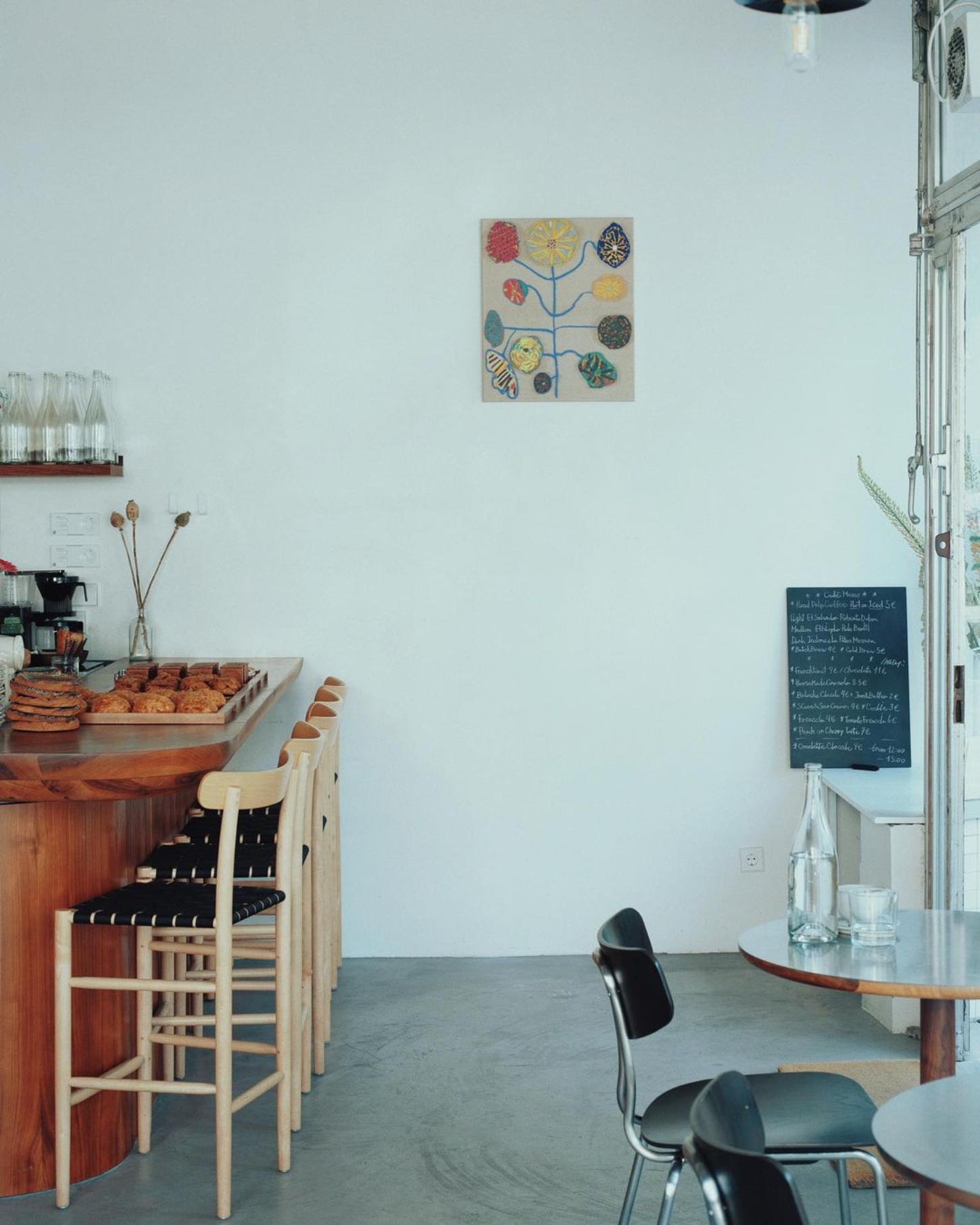 Julius in Berlin — Julius's interior prioritizes functional clarity through material honesty and spatial organization.