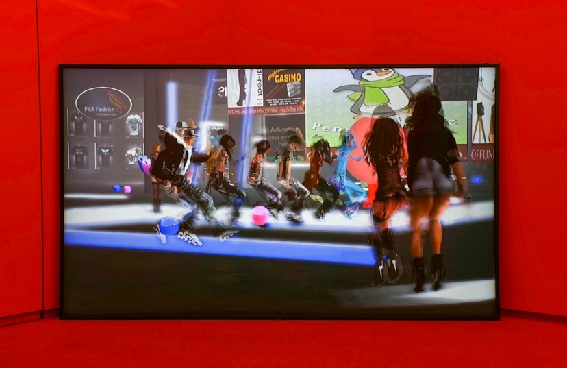 Productive Narcissism at 032c Gallery in Berlin — The gallery's saturated crimson glass facade frames a video installation displaying multiple figures in dynamic poses against an urban streetscape backdrop.