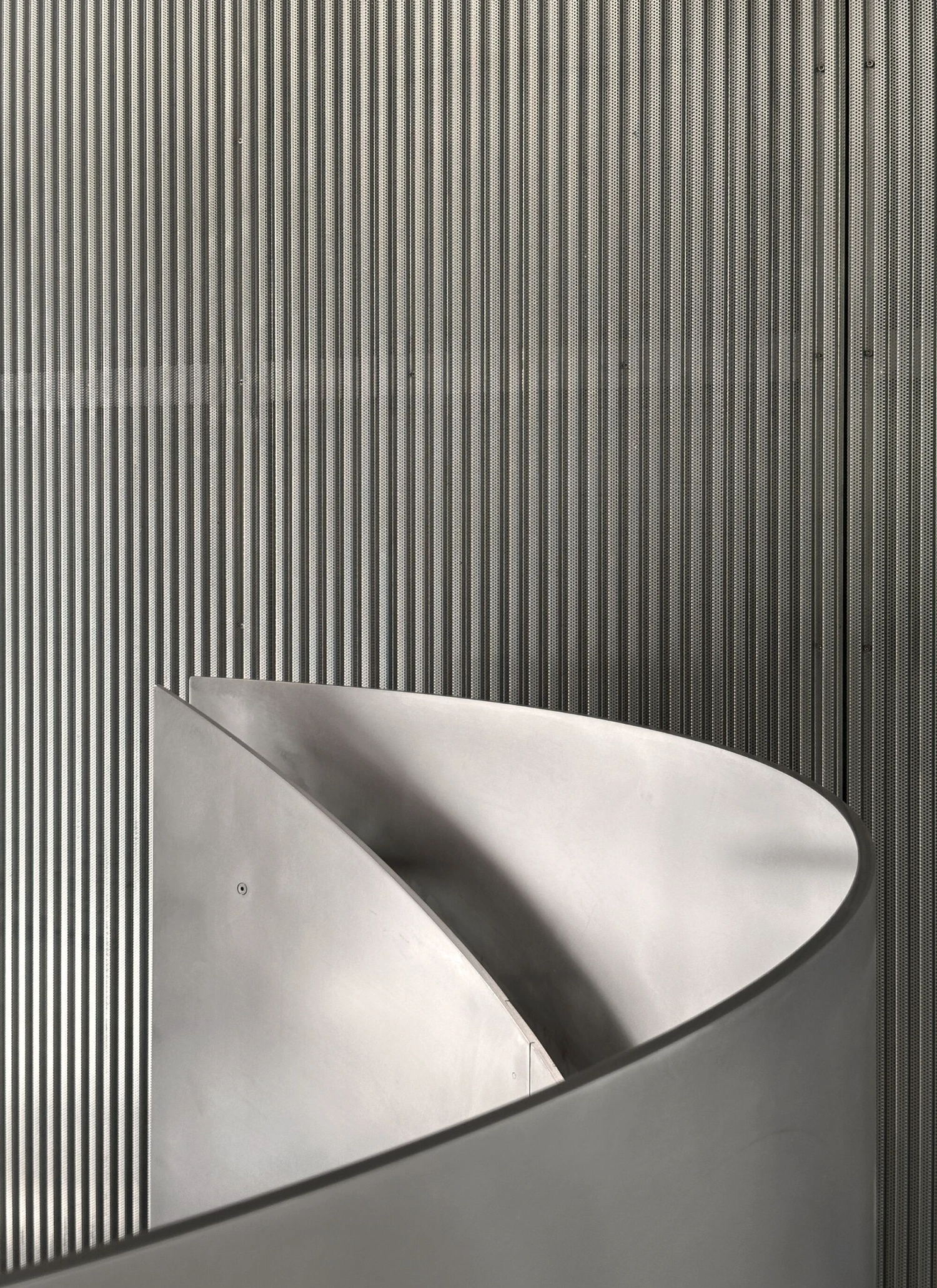 Reciprocal House by Gianni Botsford Architects — A close-up detail of the Reciprocal House's southwestern corner reveals the interplay of materials and shadow.