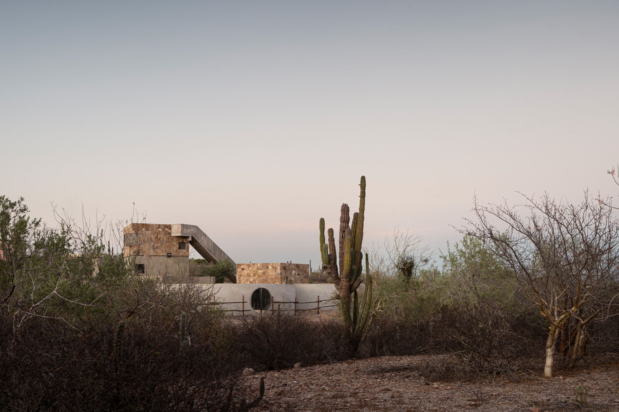 Casa La Paz by Ludwig Godefroy Architecture — Casa La Paz emerges from the Baja California scrubland as a sculptural composition of stacked volumes.